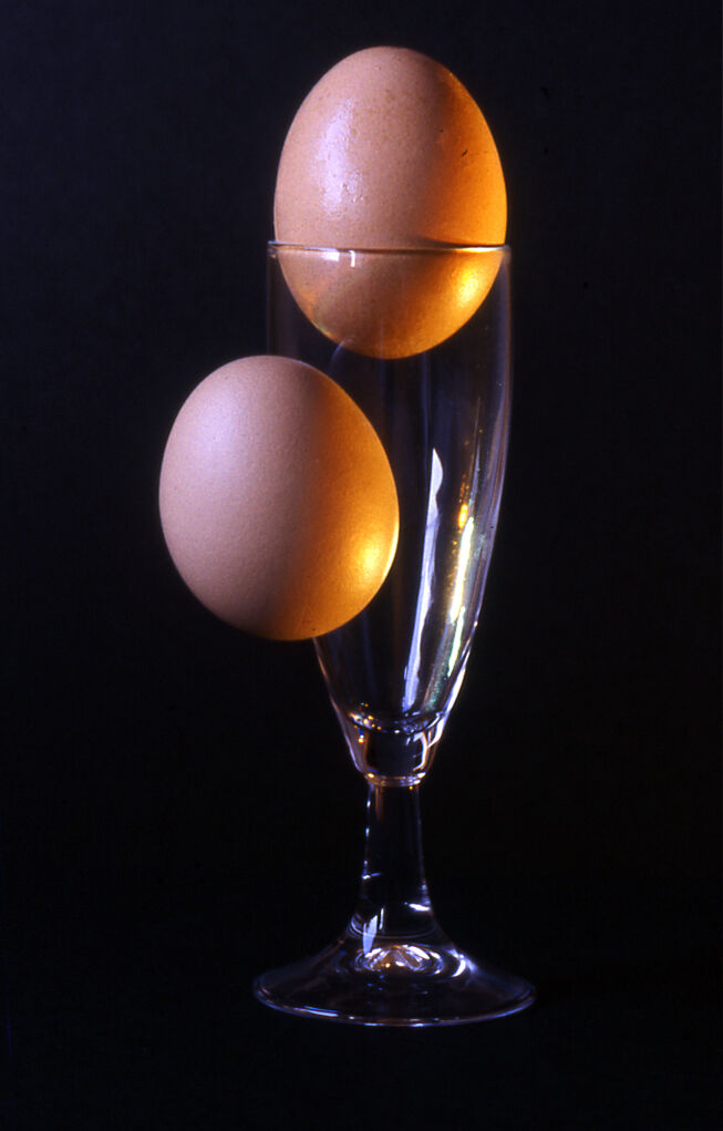 eggs suspended in glasses
