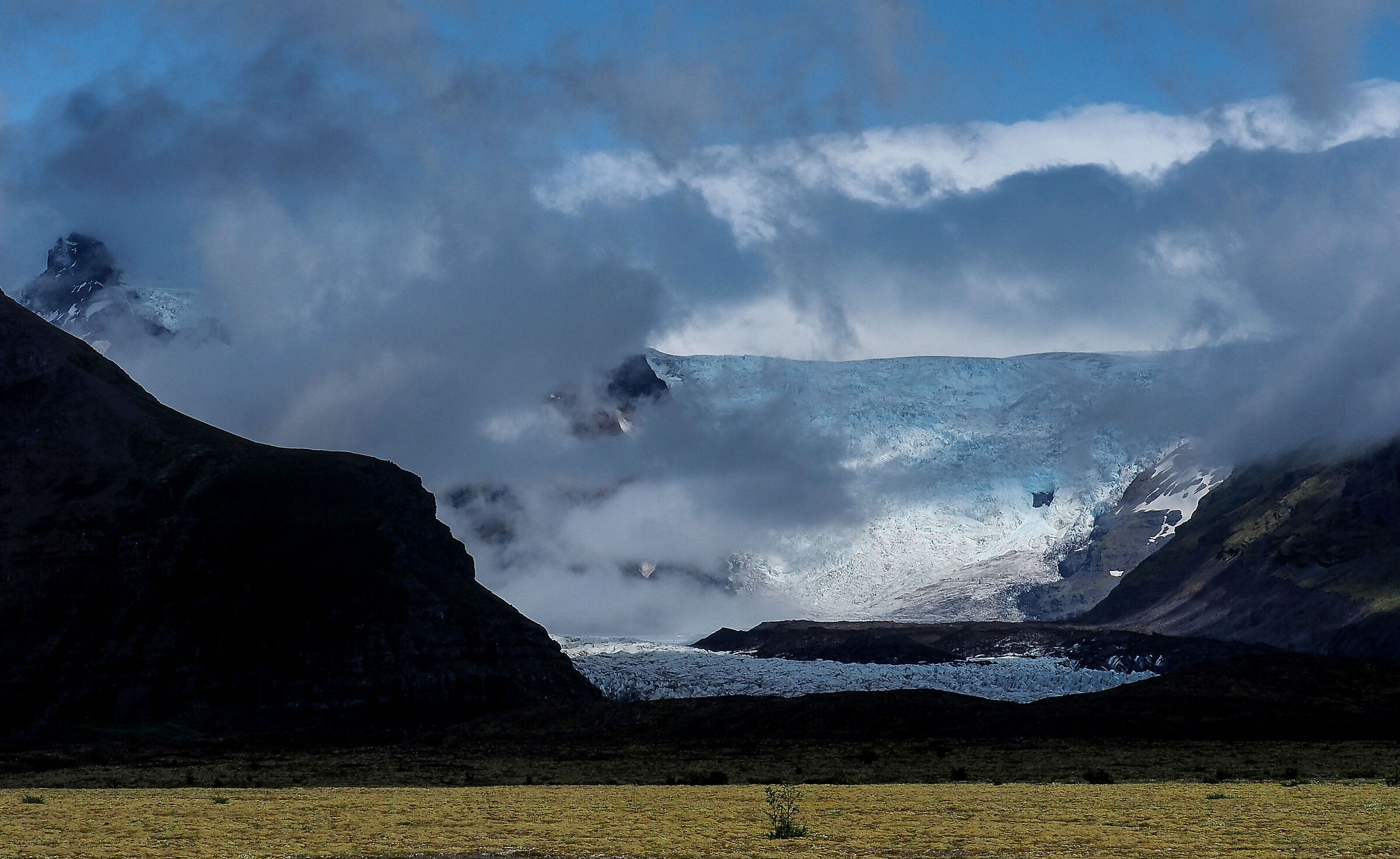 from the clouds the ice appears, we are in Iceland