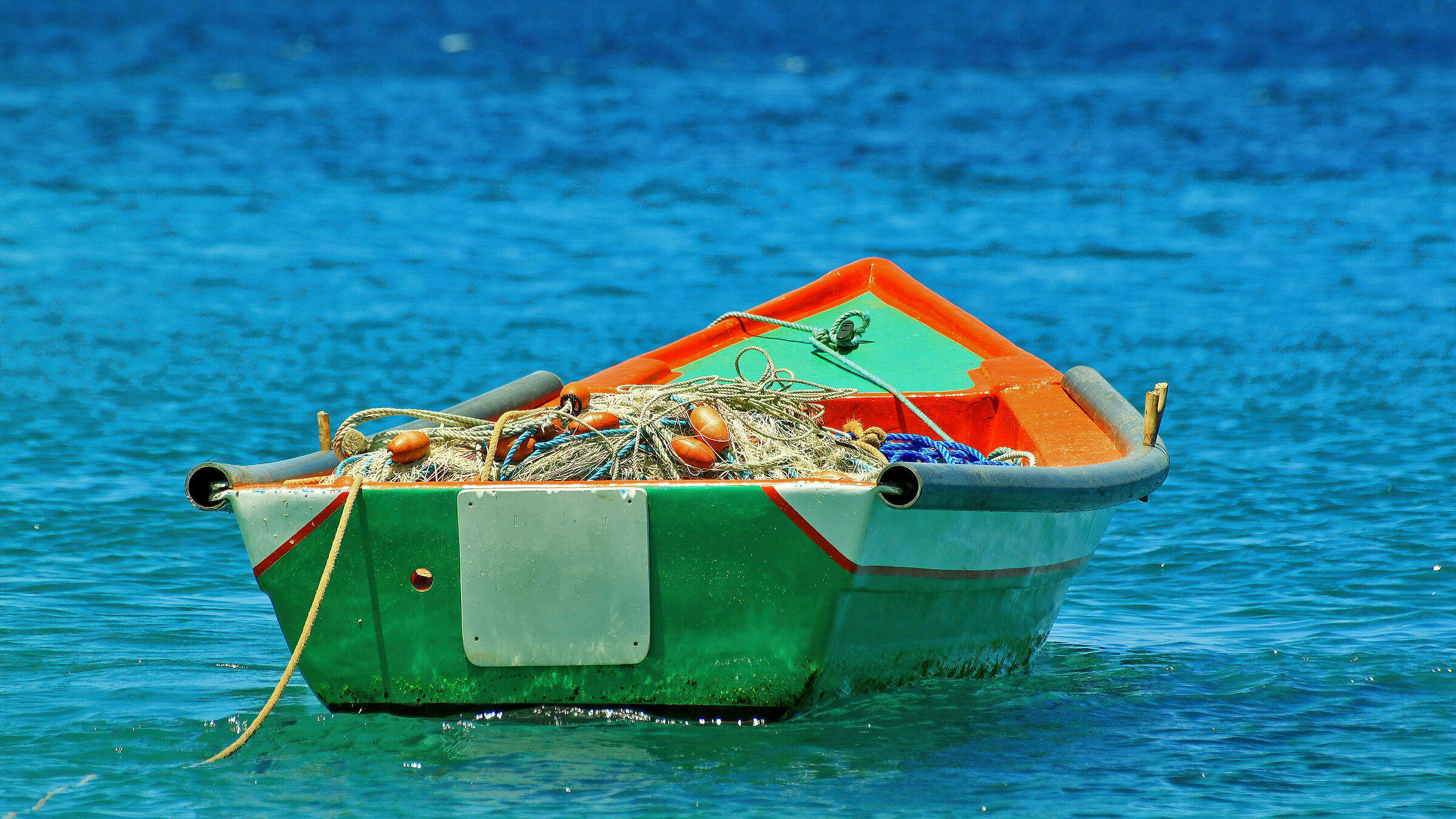 The boat in the middle of the sea