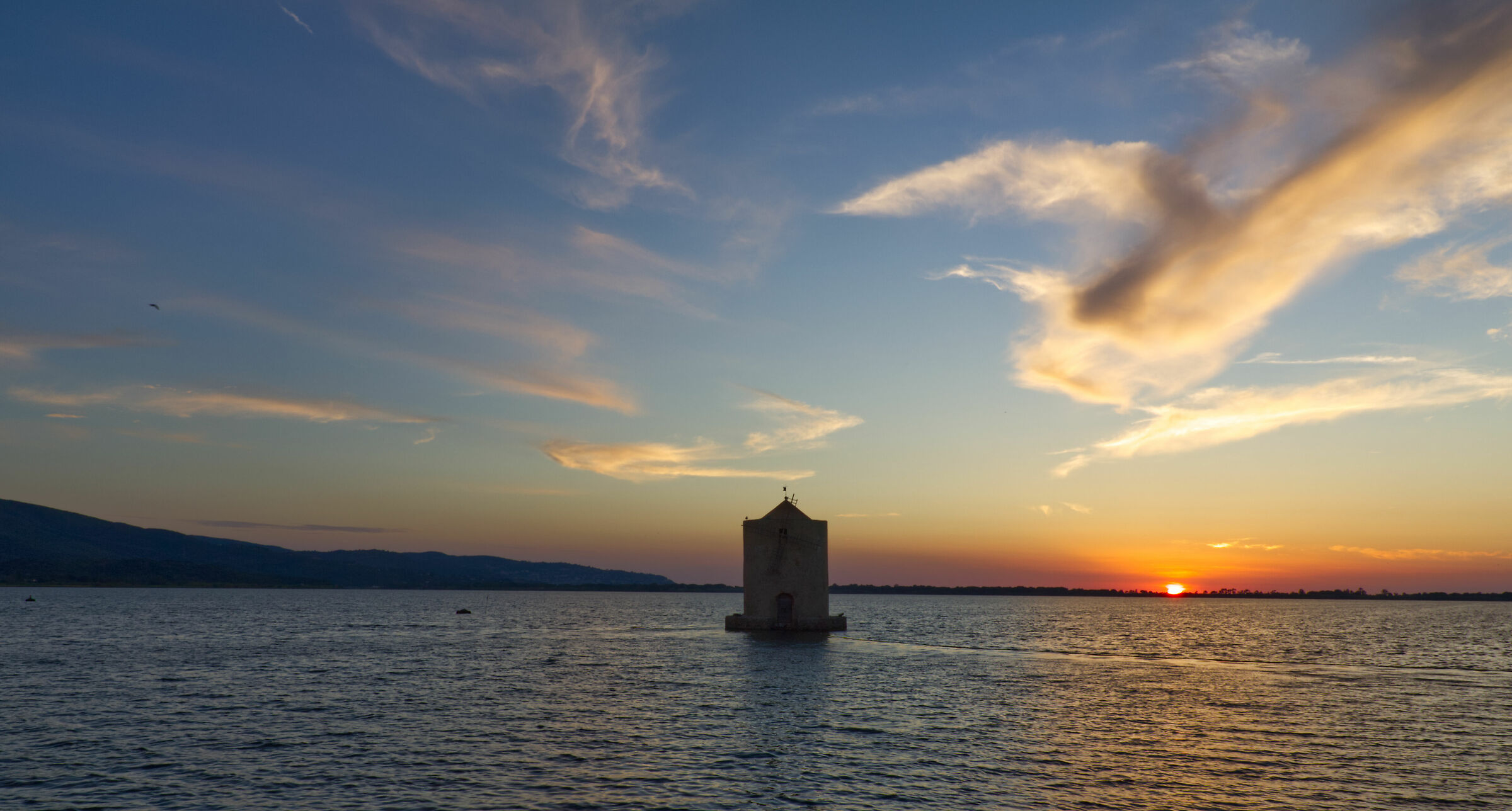 il tramonto,il mulini, e la laguna