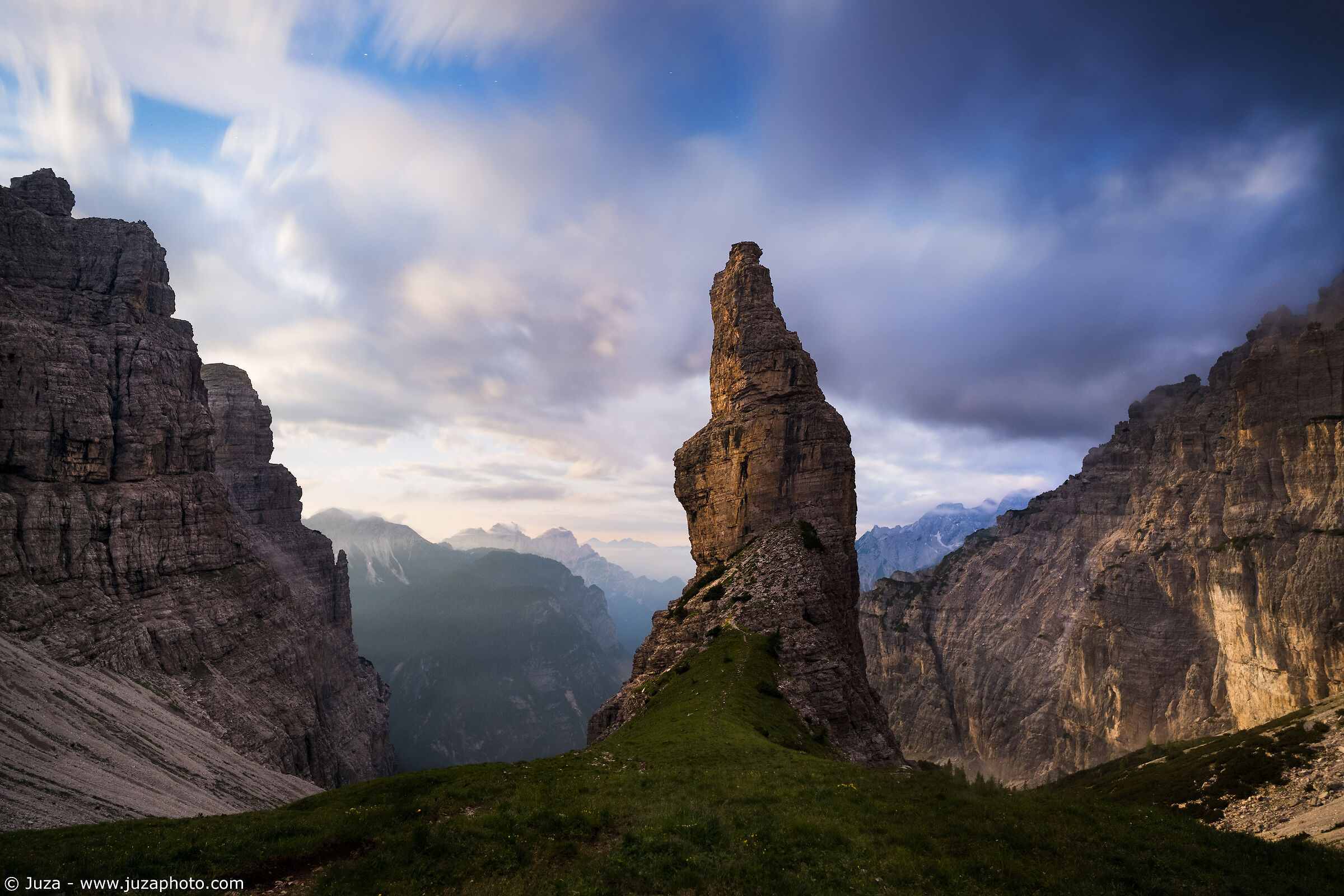 The bell tower of Val Montanaia, in the light of the moon
