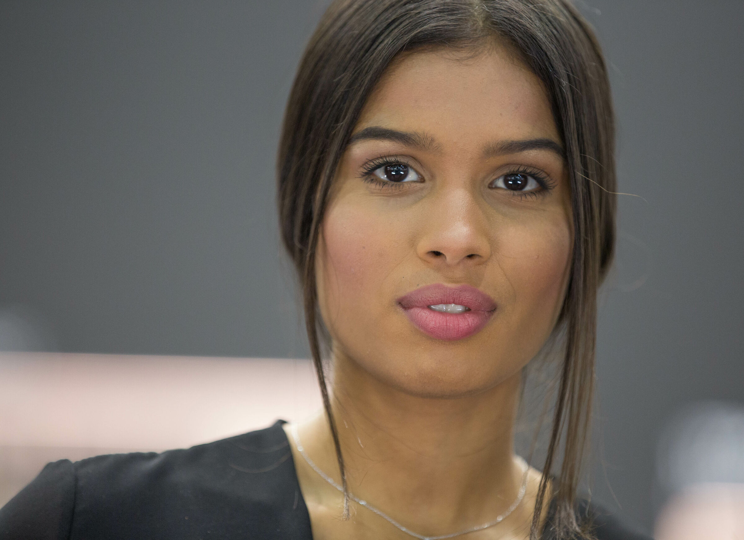 The color of his brown eyes in the blue of my