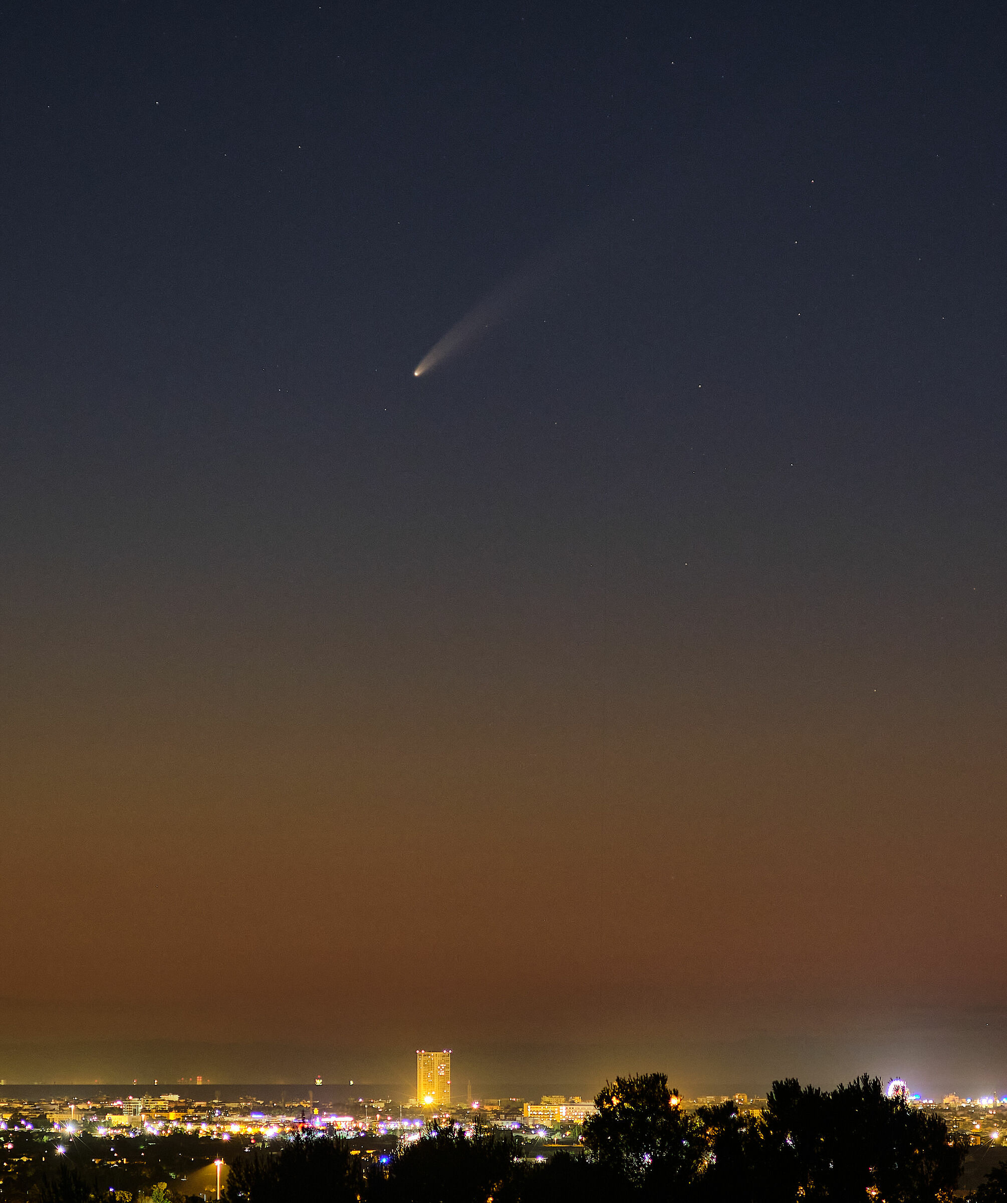 The neowise comet above the Rimini skyscraper