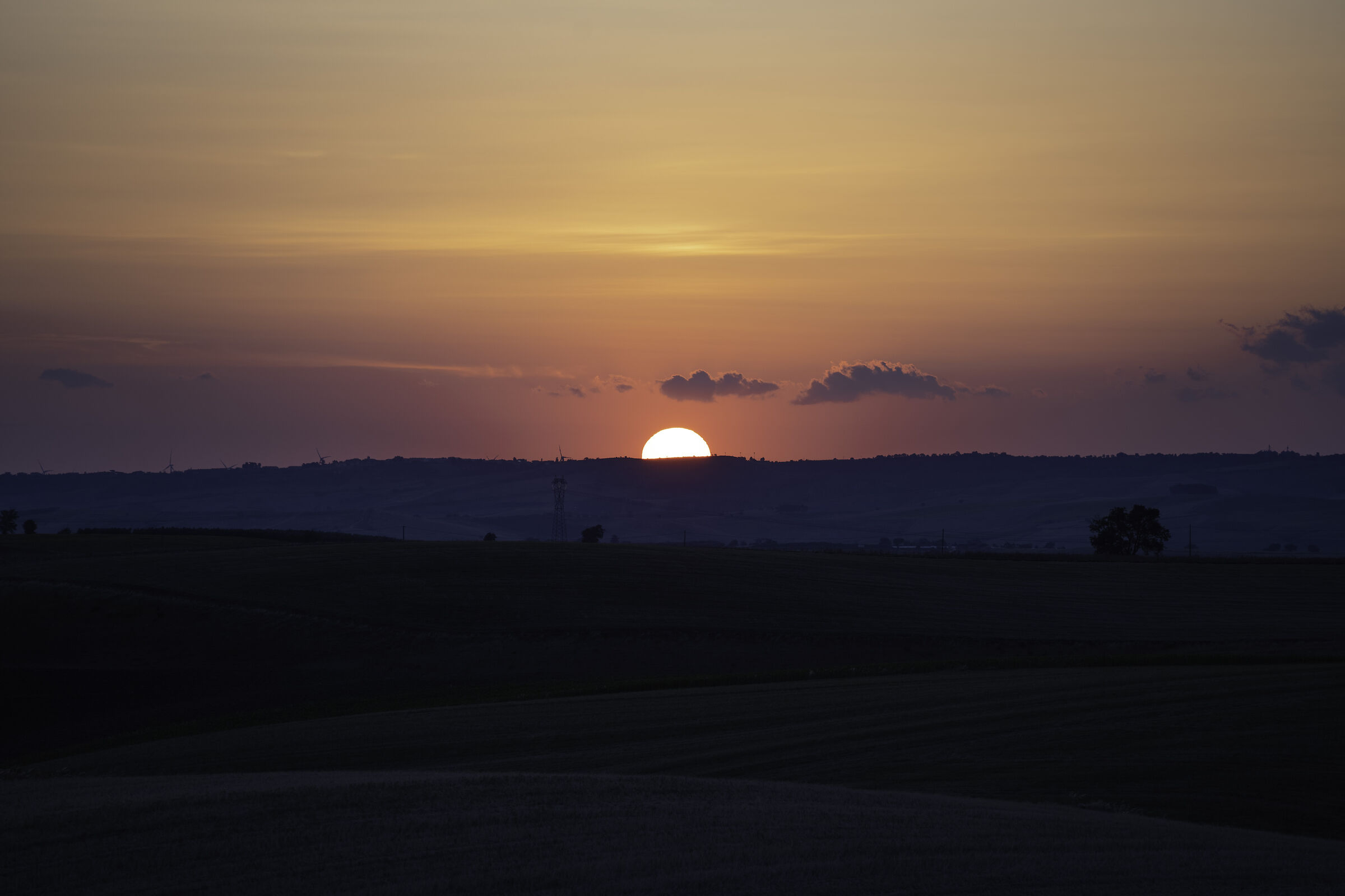 Sunrise with sun in half.