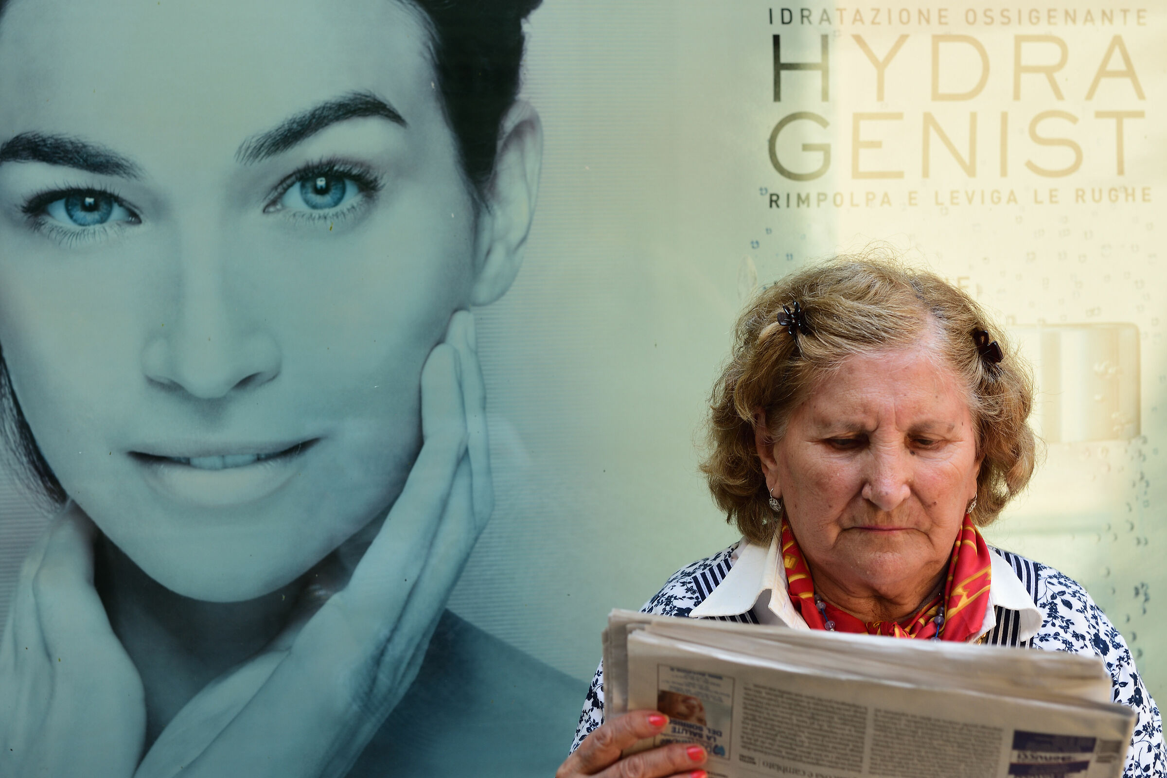 The lady with the paper.