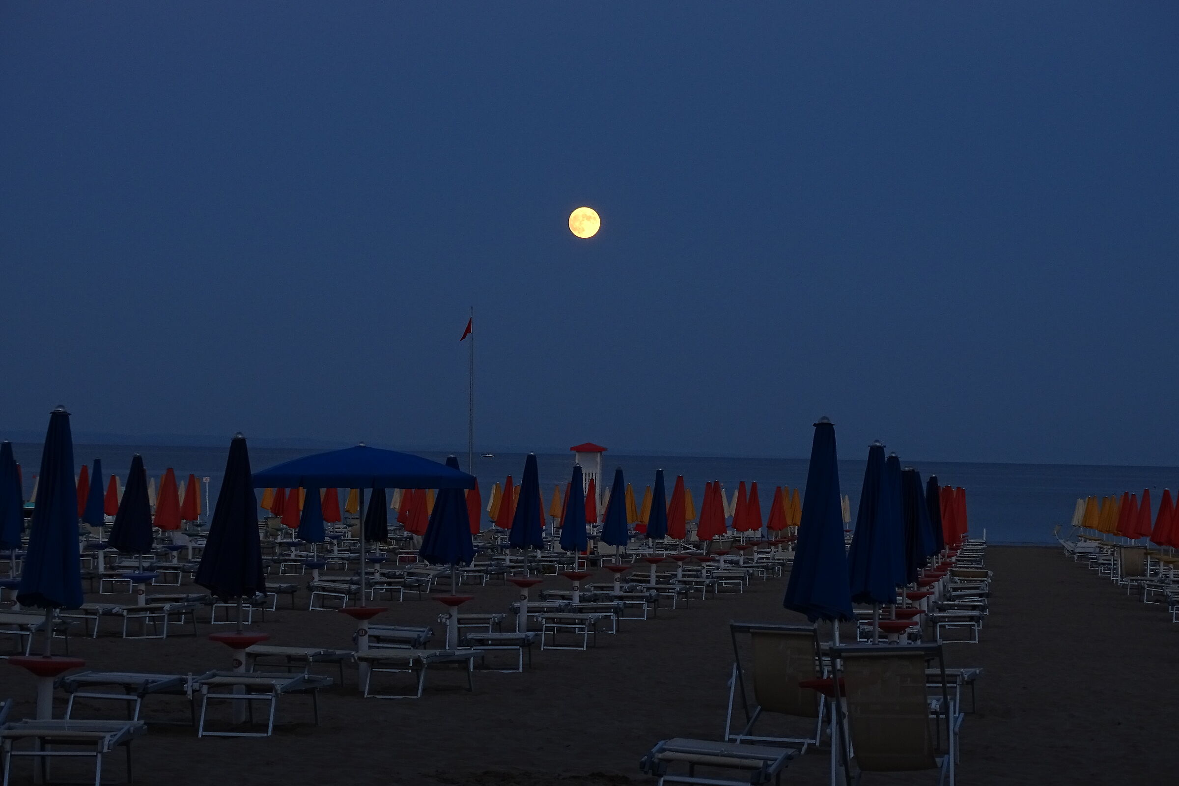 Blue time between umbrellas