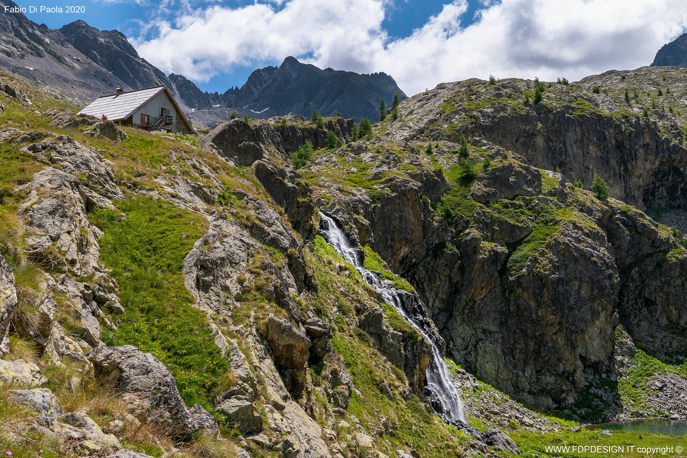 the hut and the waterfall