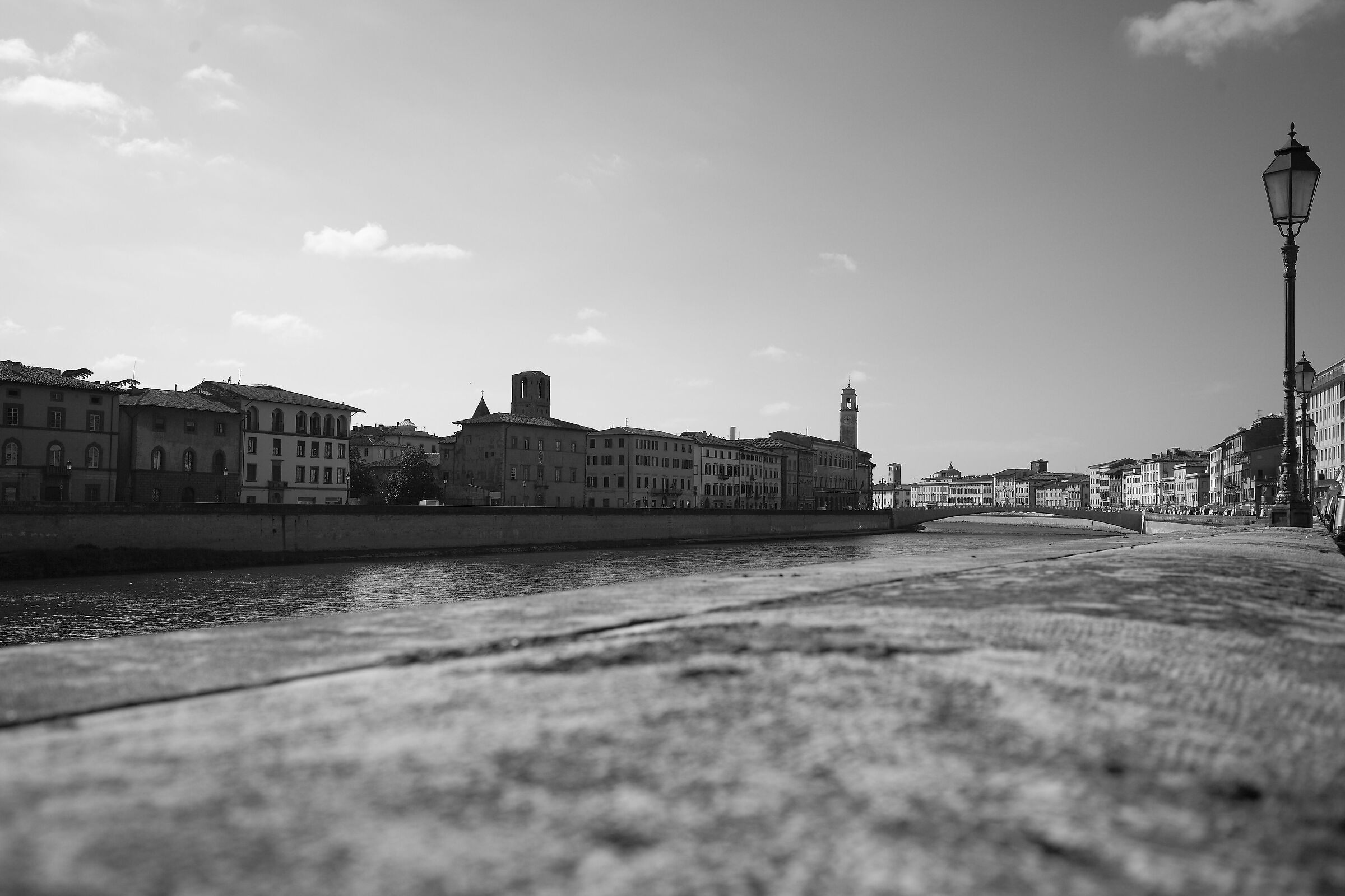 Water and words glide under bridges