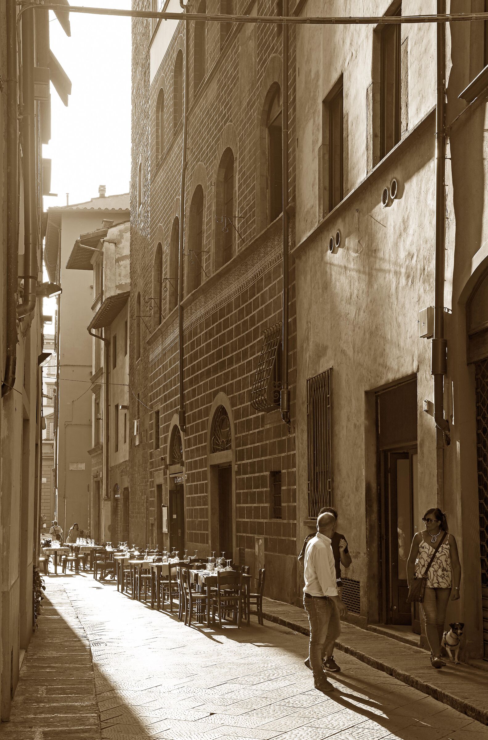 Via del Campanile with coffee tables