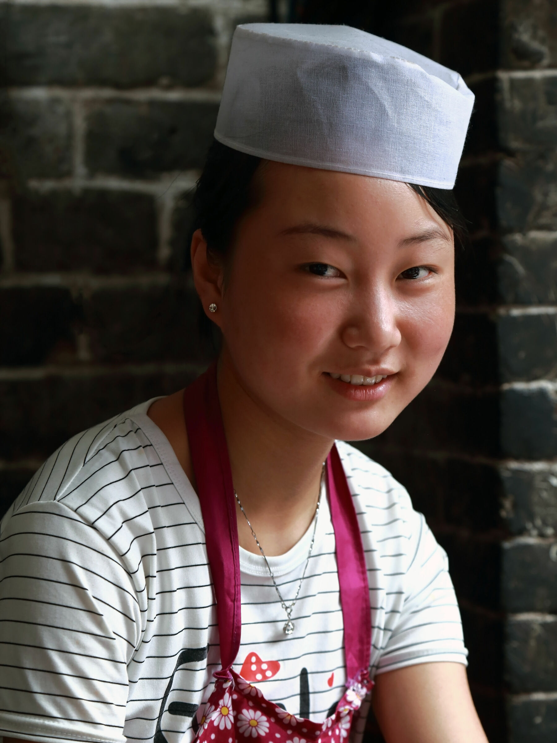 La piccola venditrice di focaccia azzima