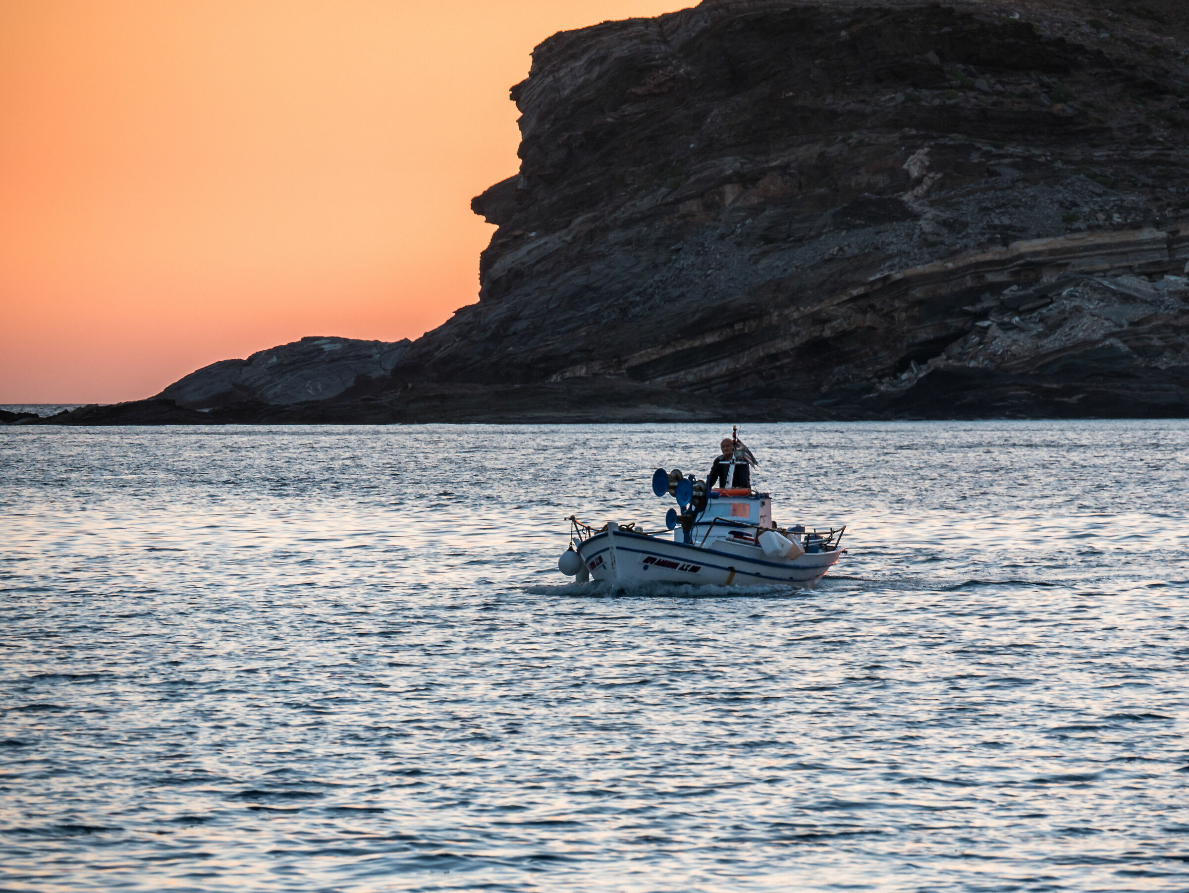 Fisherman at dawn - Tinos Island - Greece