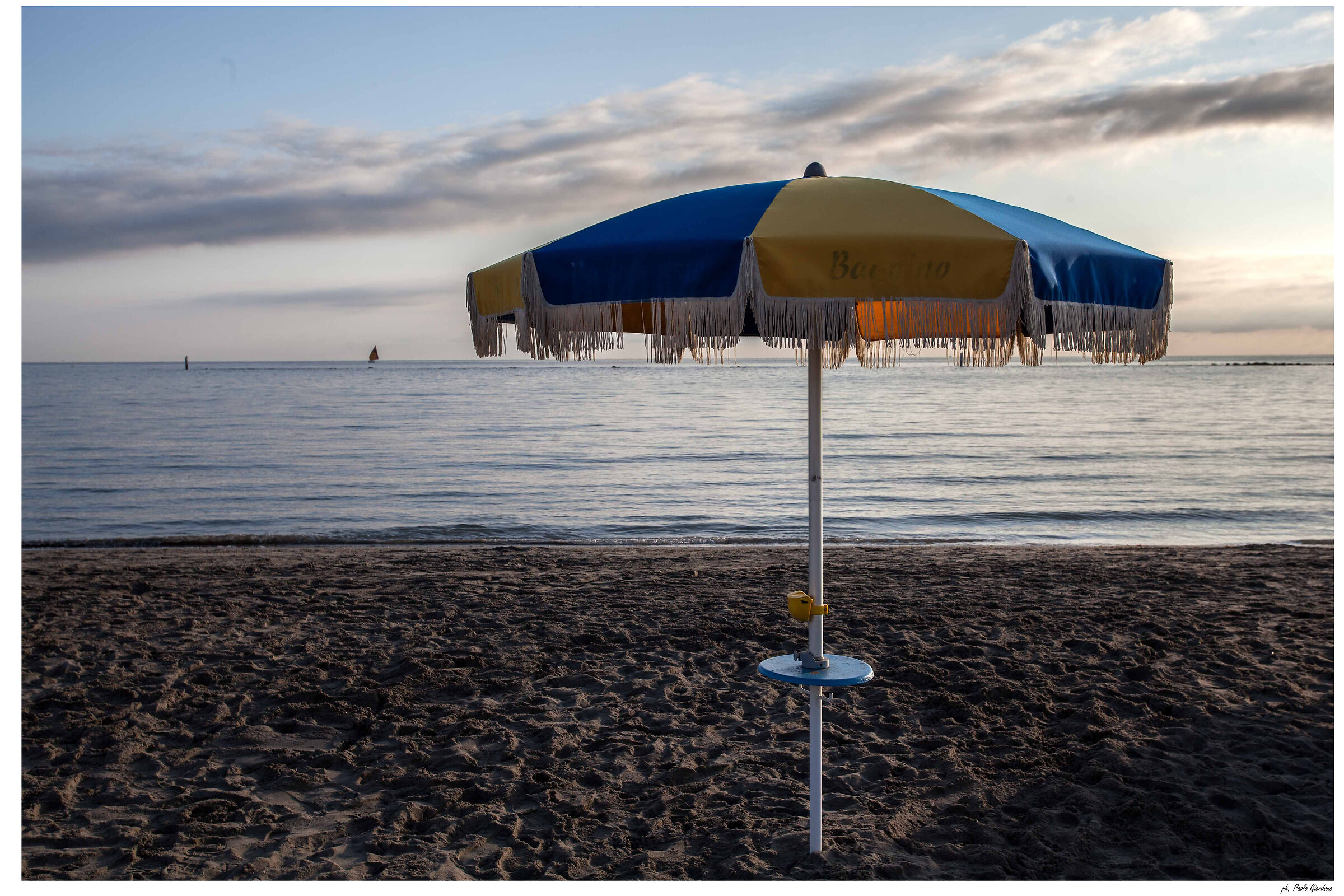 lifeguard, a parasol and two sunbeds, thank you