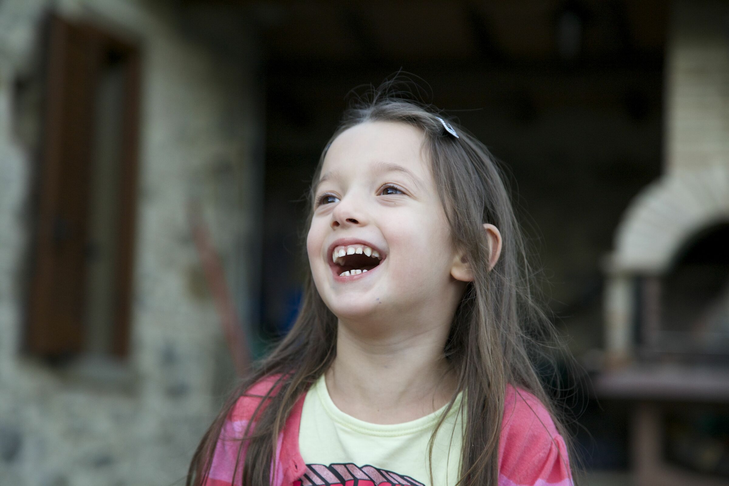 A spontaneous smile.