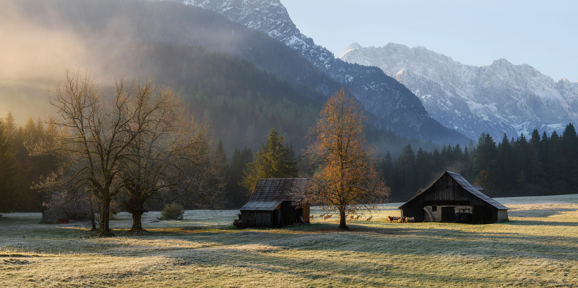 Farm under the mountains