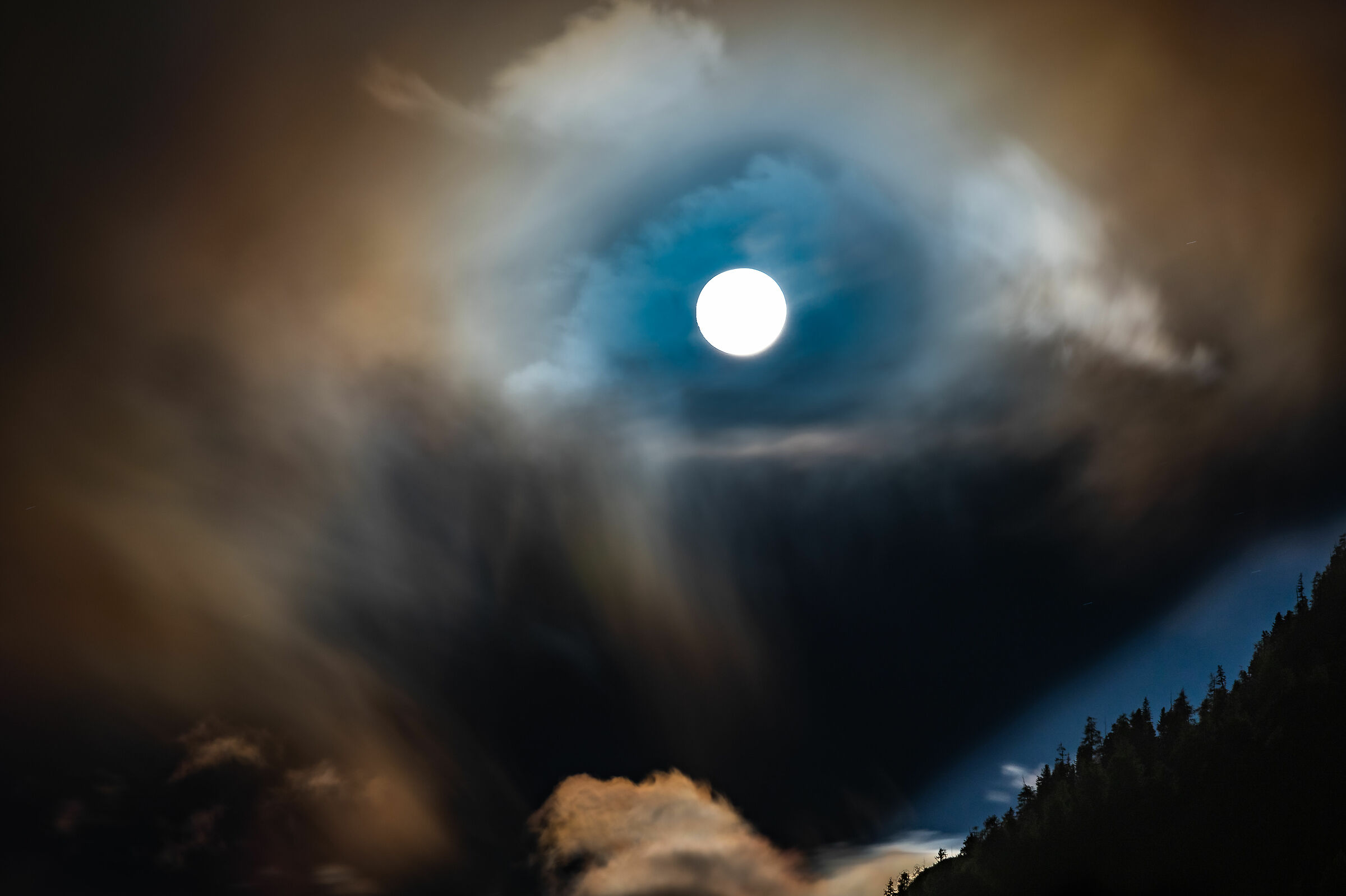 the moon in the clouds