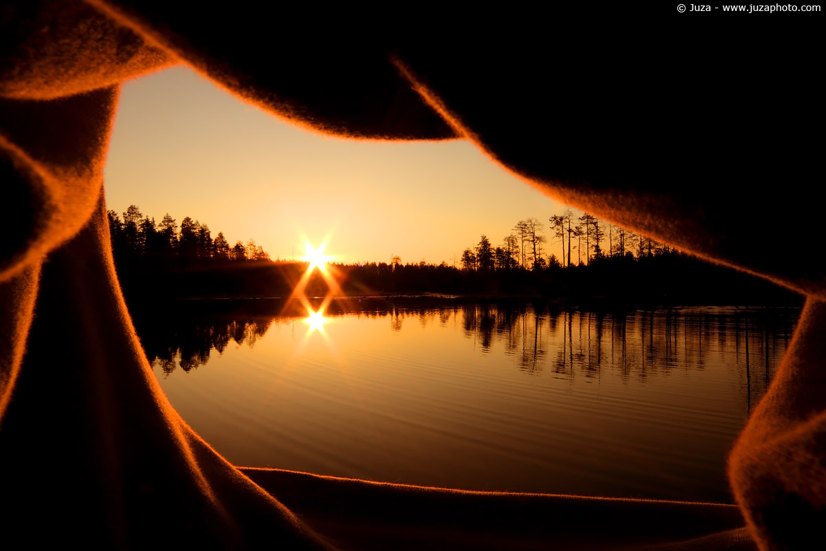 Sunrise from the window of a hut, 009794