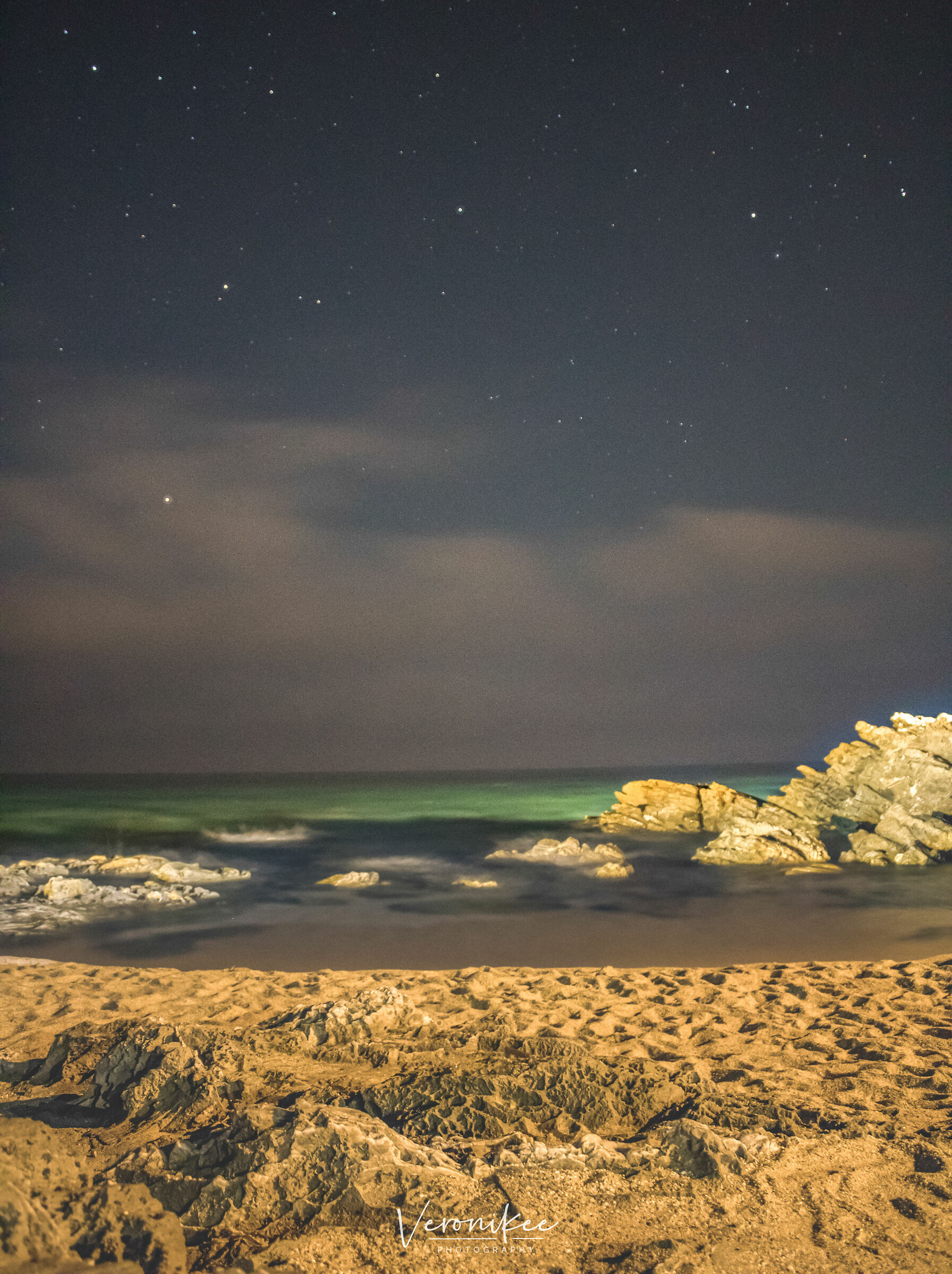 Cielo notturno in riva al mare