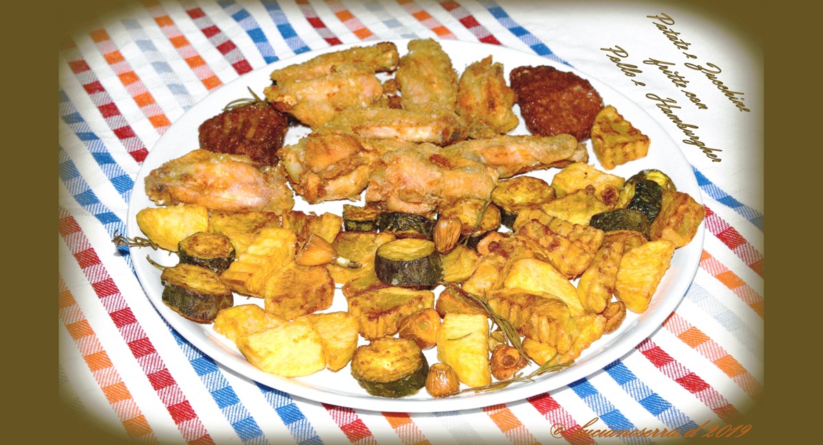 Fried potatoes and zucchini with chicken and hamburgher