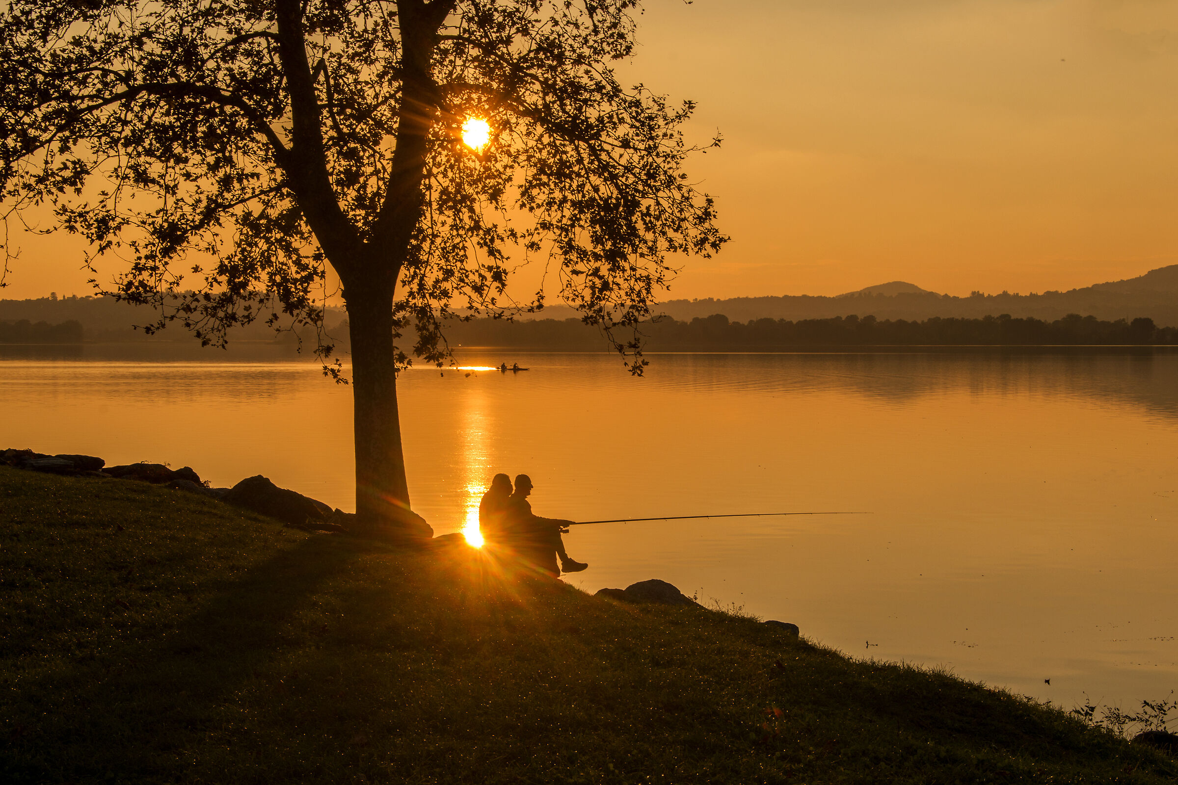 fishermen in the sunset