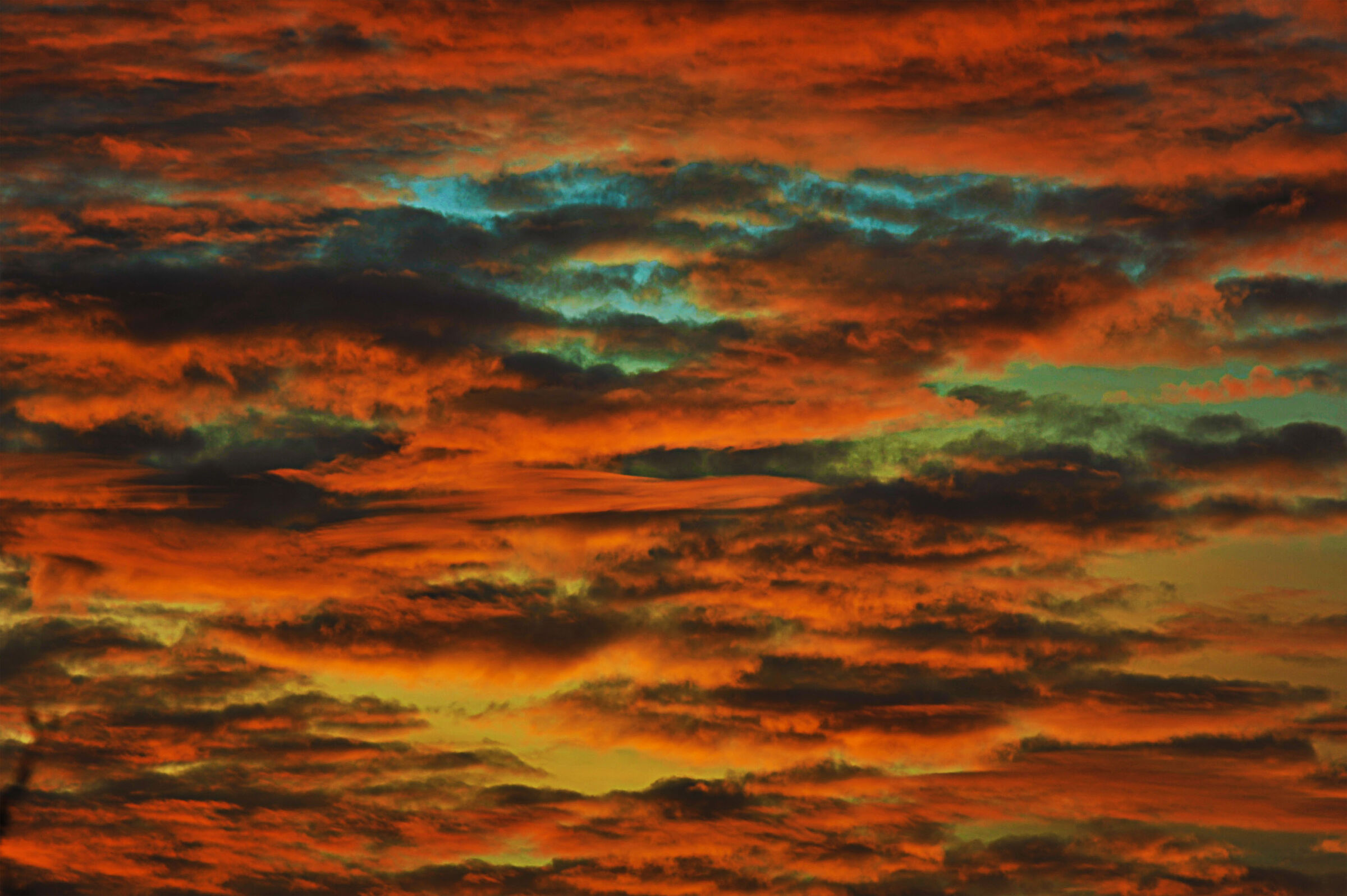 the sky is blue above the clouds