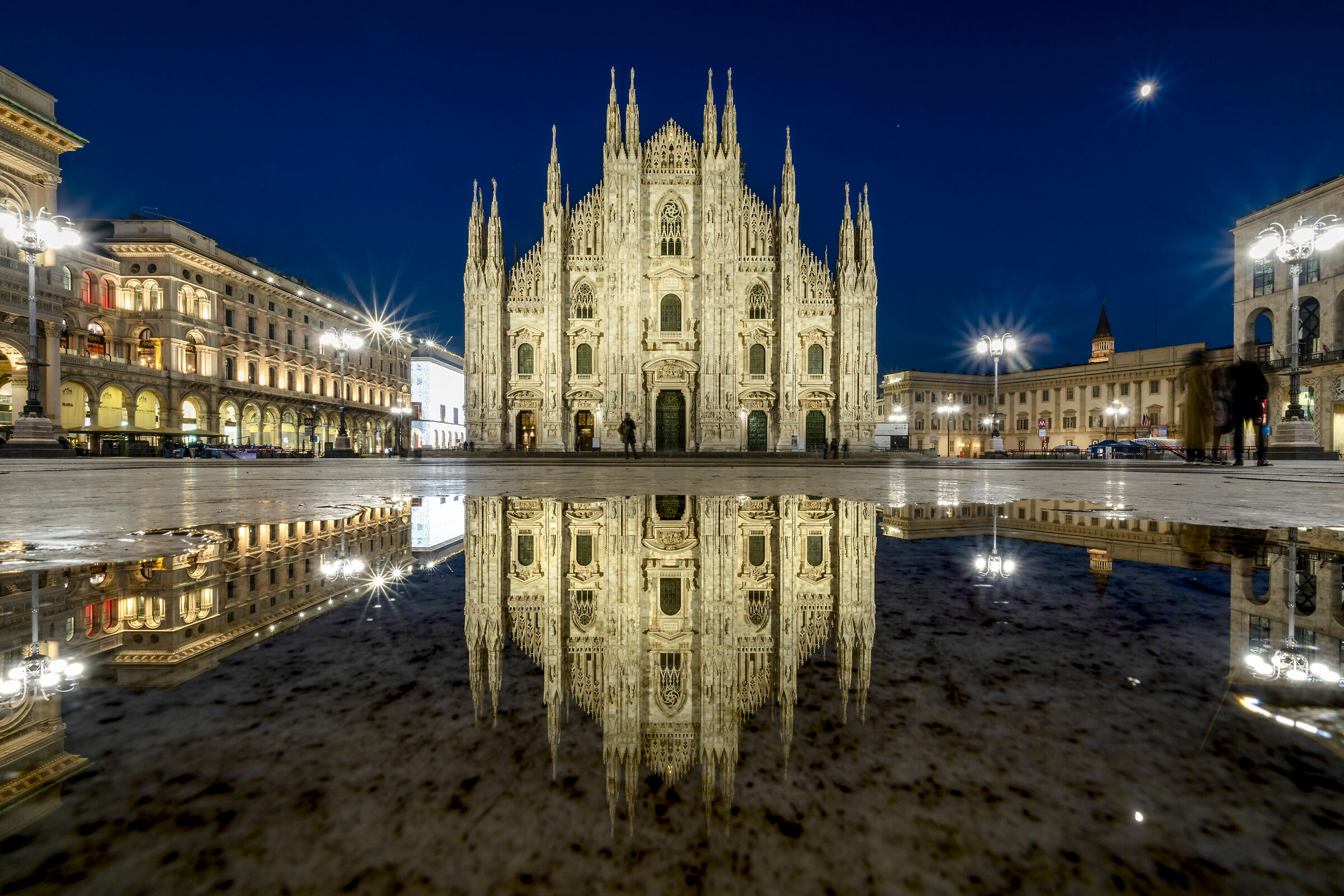 Reflections in a deserted Piazza Duomo