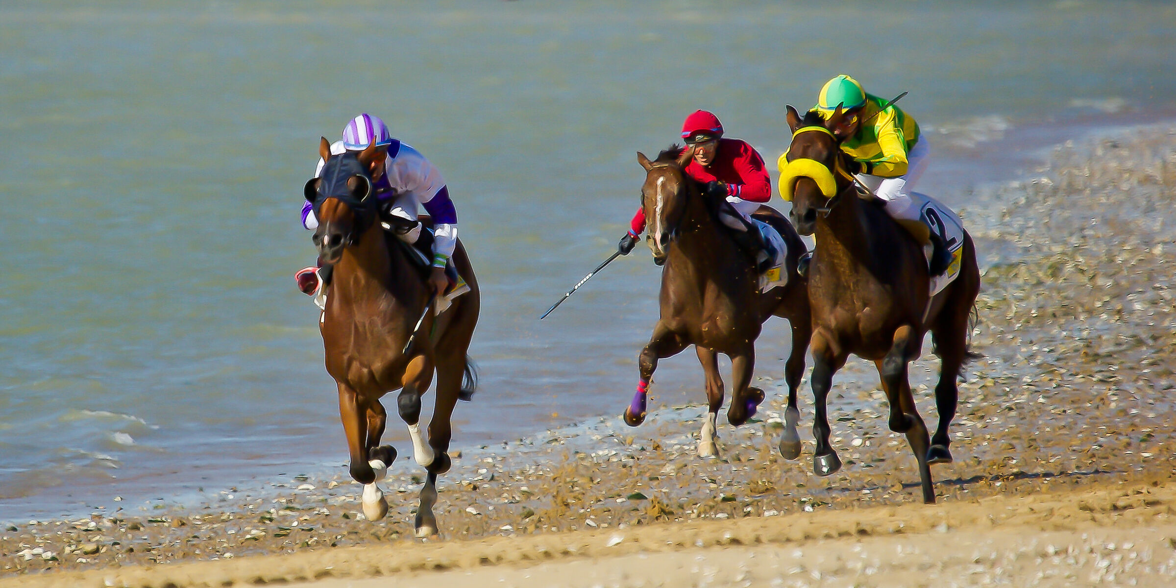 Riders on the beach