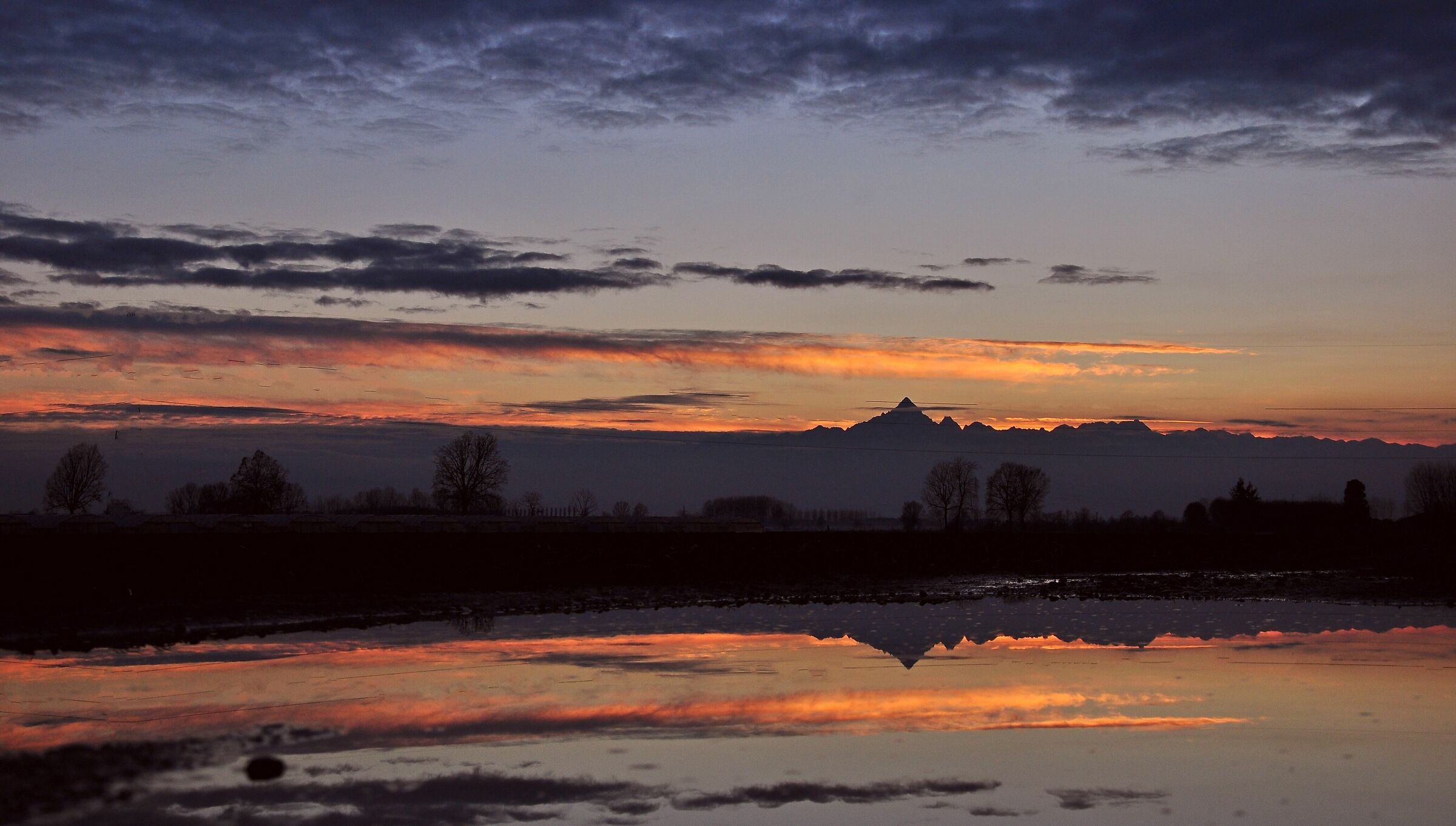 Sunset with assistant a large puddle me