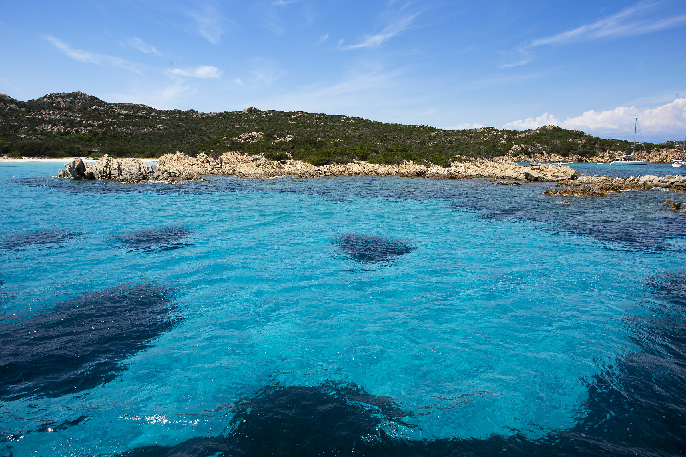 Second rock on the left, that's the pink beach