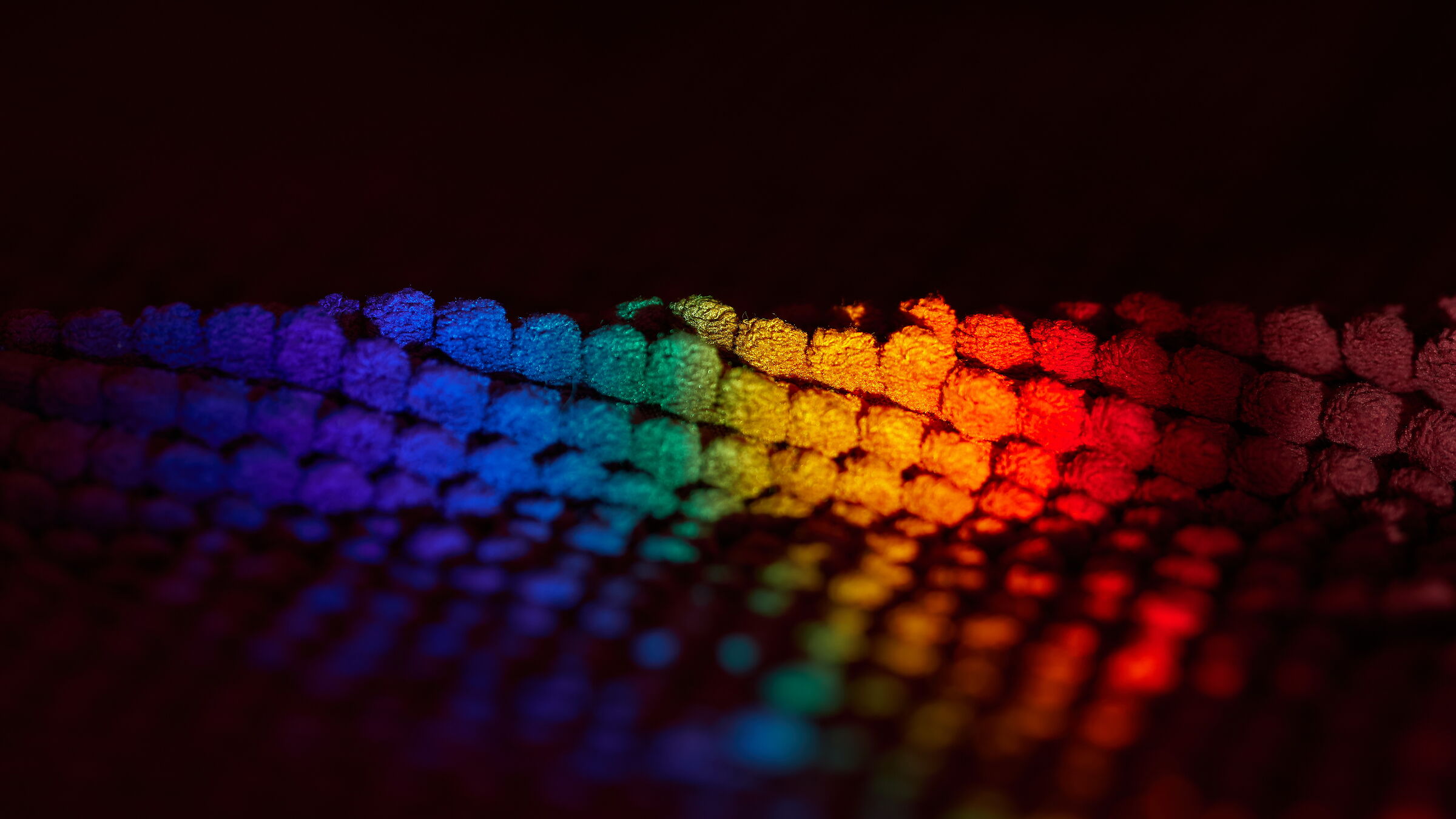 Light spectrum on burgundy microfiber mat