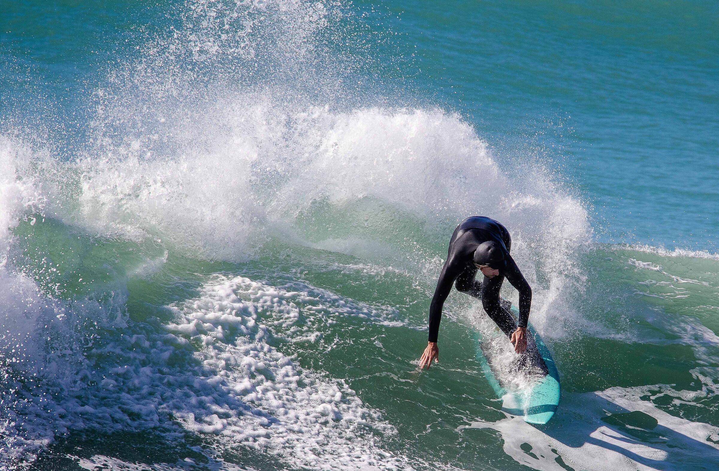 A guy while surfing - Levanto