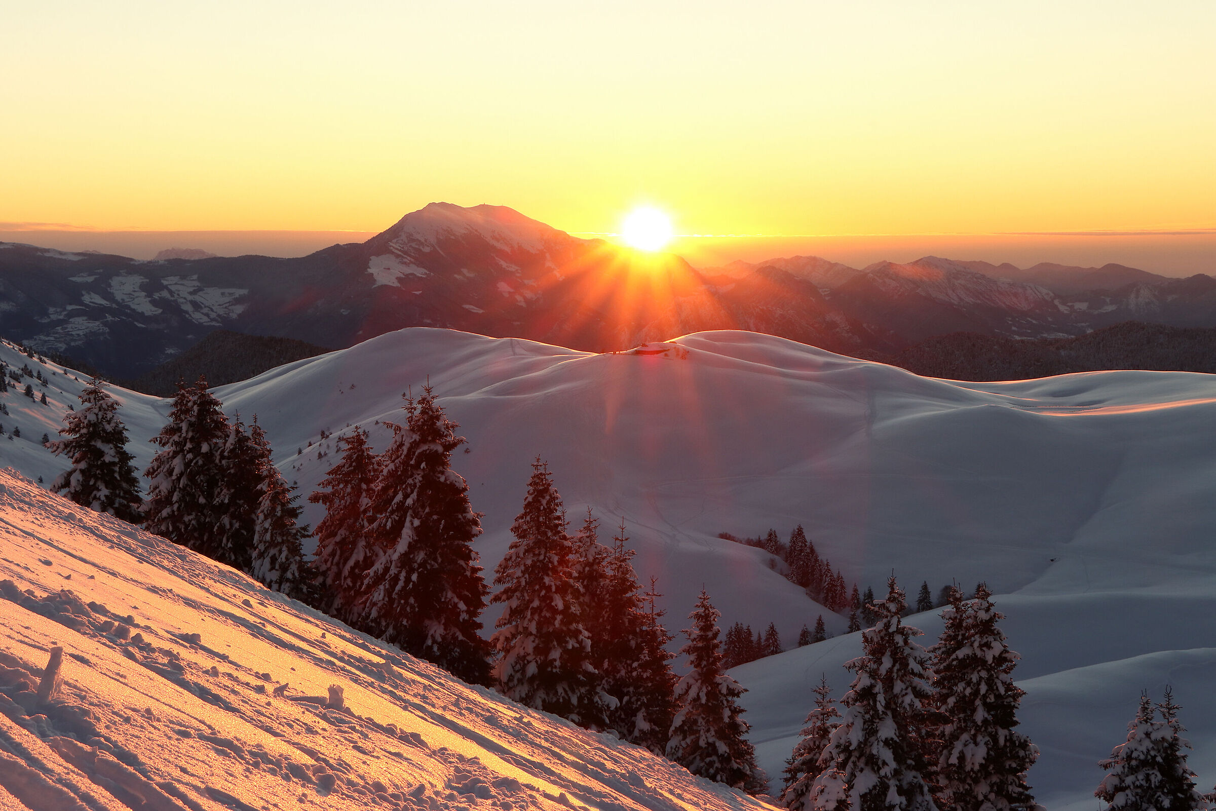 sunrise over the peaks