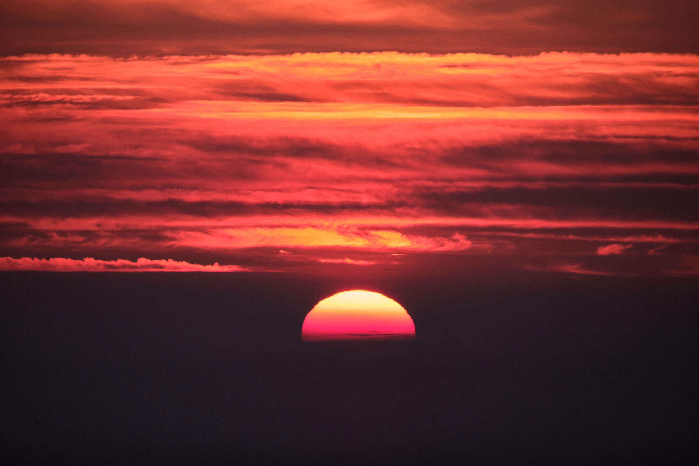 Tramonto tra le nebbie padane
