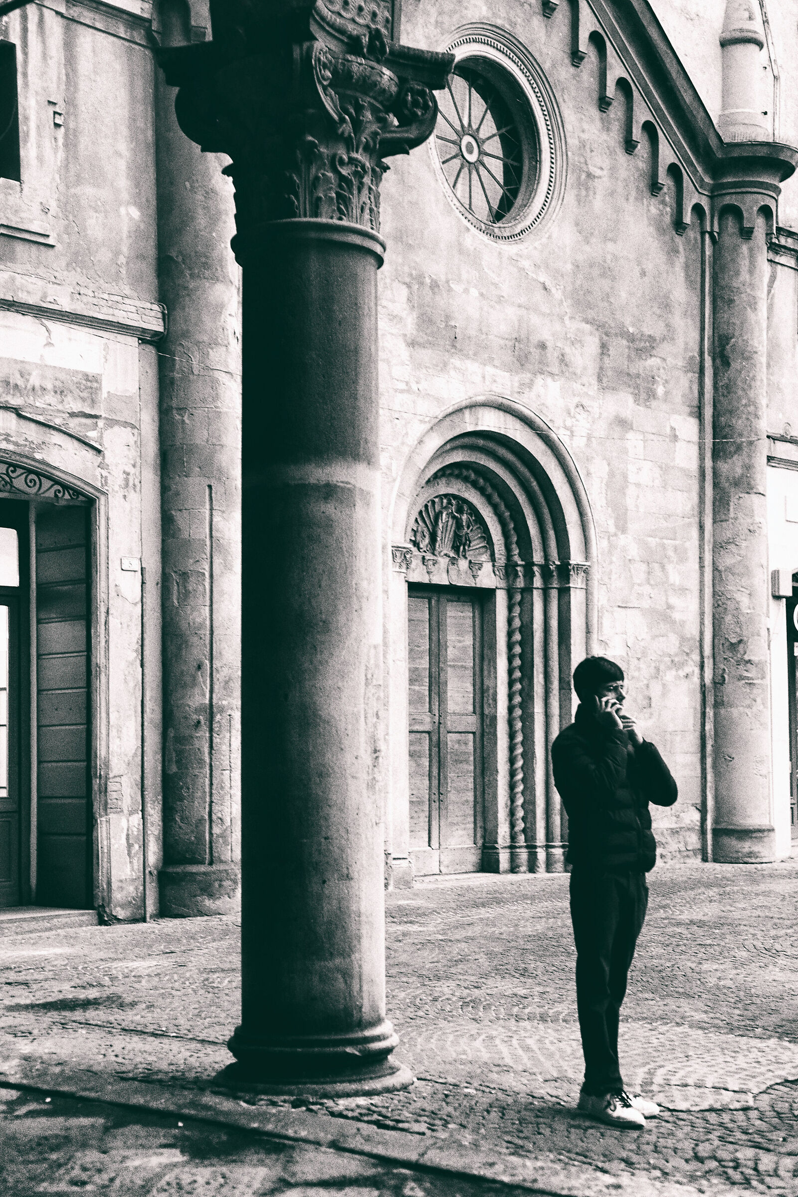 Man and architecture. And the cell phone....