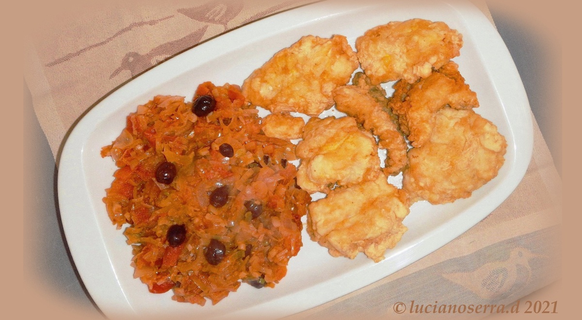 Breaded and fried cod with side dish