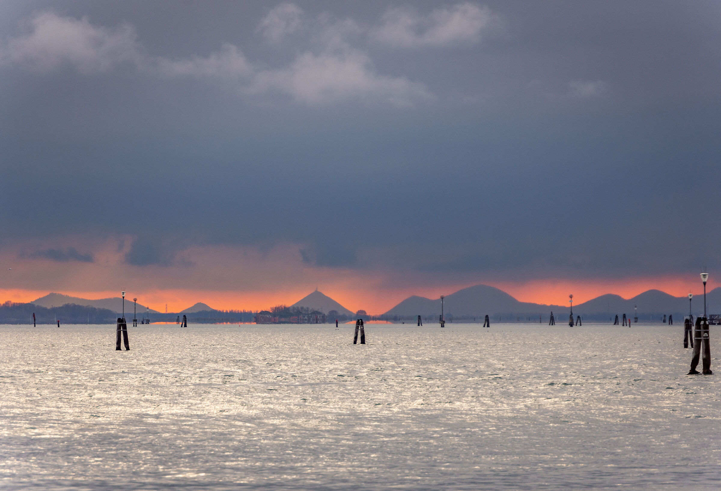 Sunset in the lagoon, Euganean hills in the distance