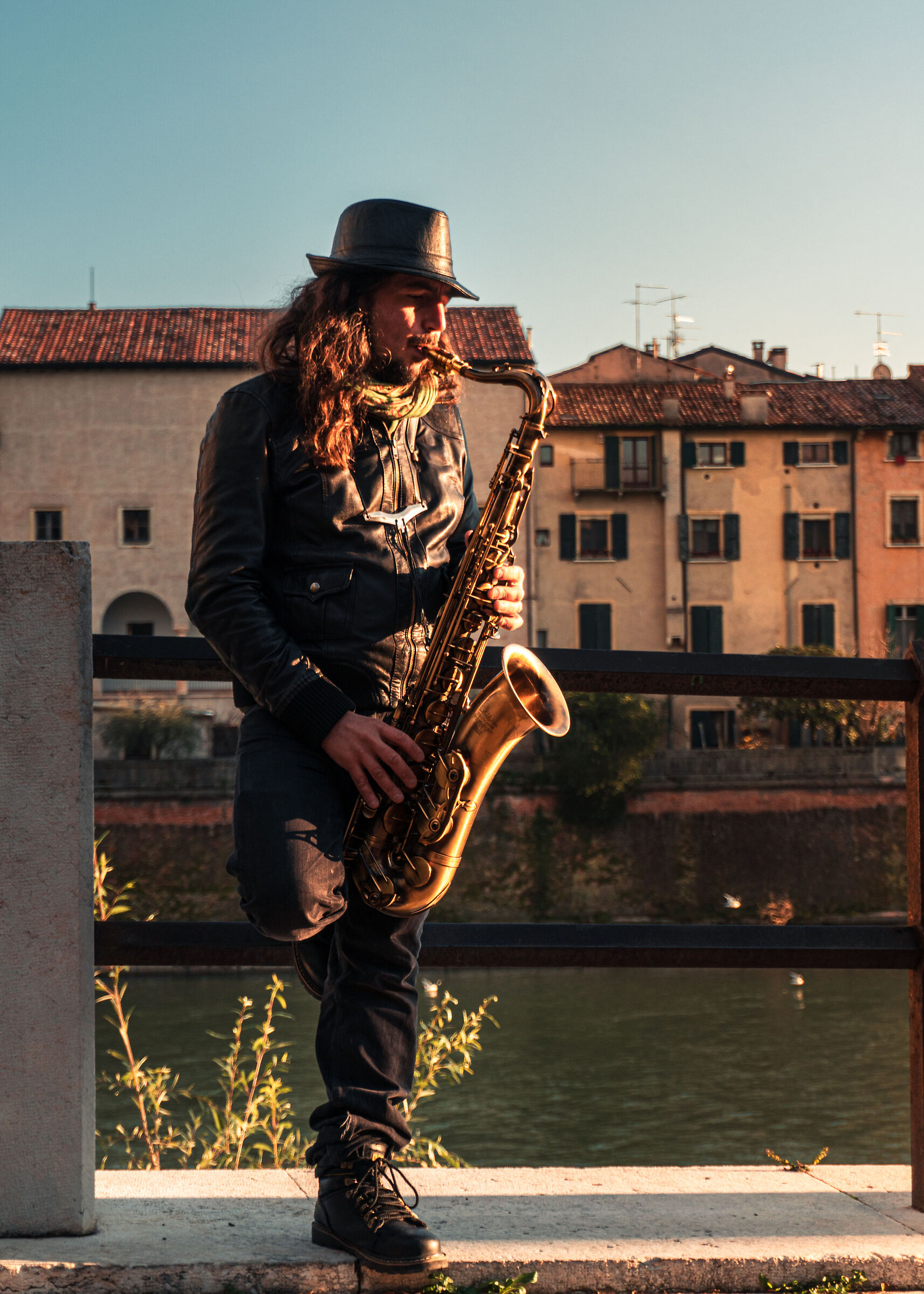 A Saxophonist in the street of Verona