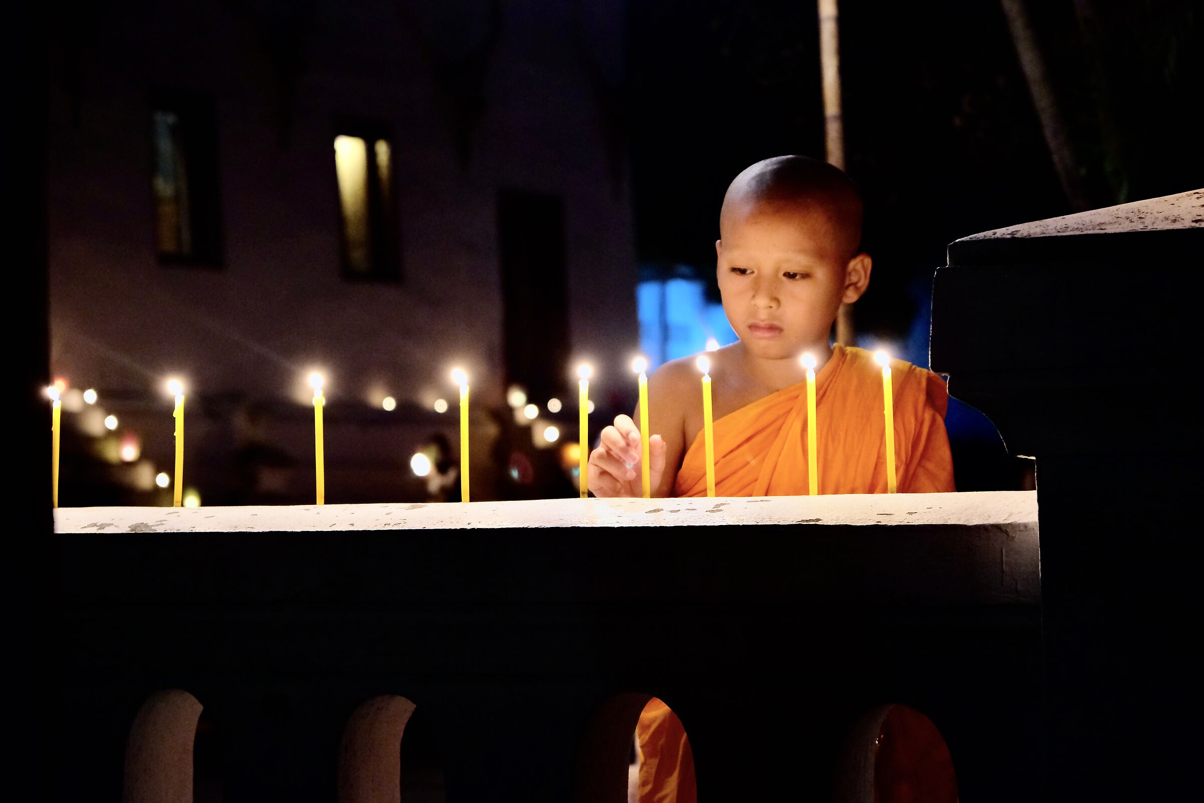 Novice Monk duringLight festival in Luang prabang Laos