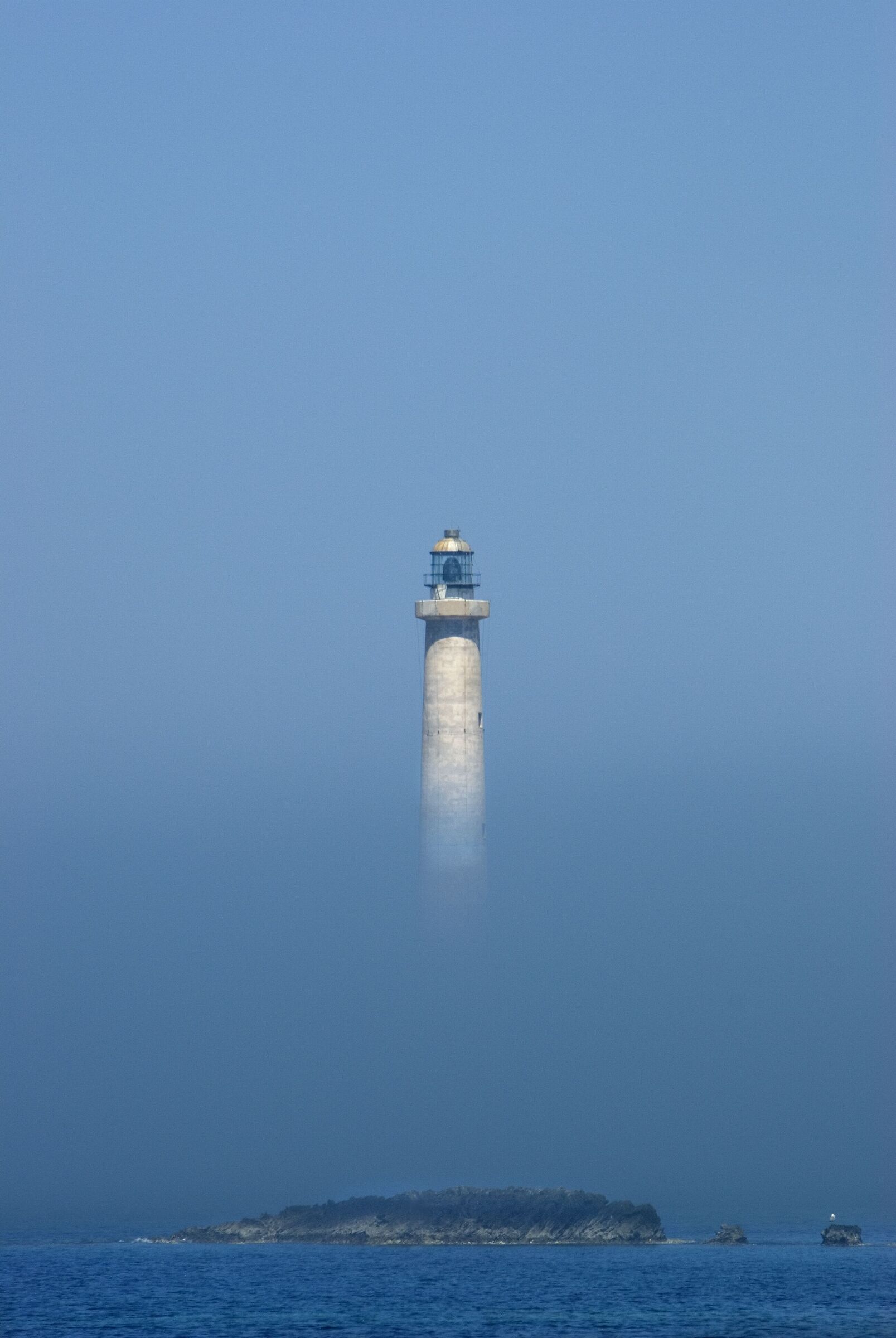 Lighthouse of Favignana in the fog of August...