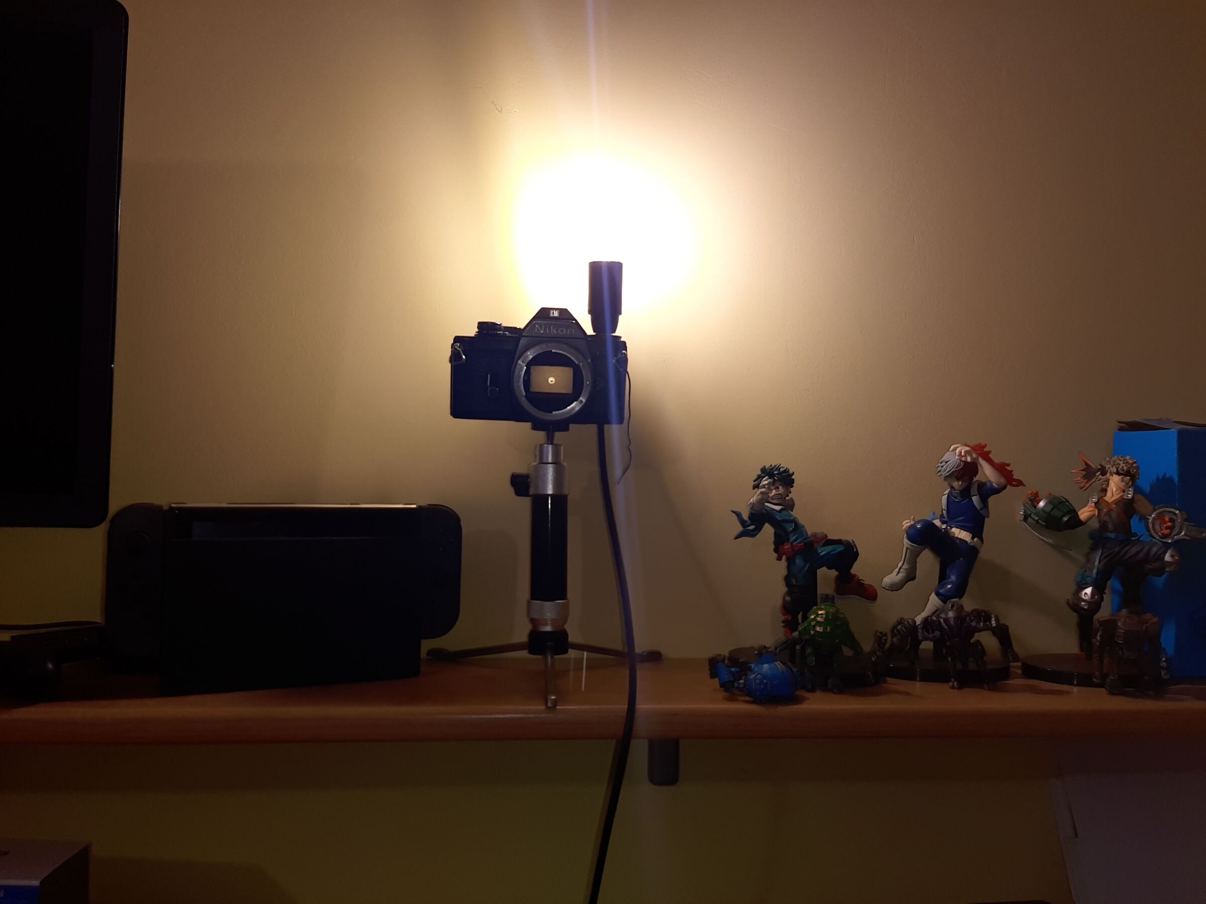 I gave light back to the Nikon EM 1