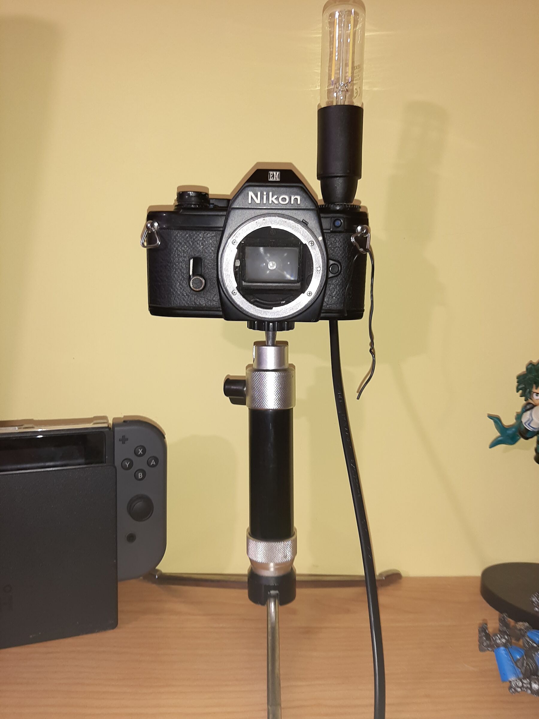 I gave light back to the Nikon EM 2