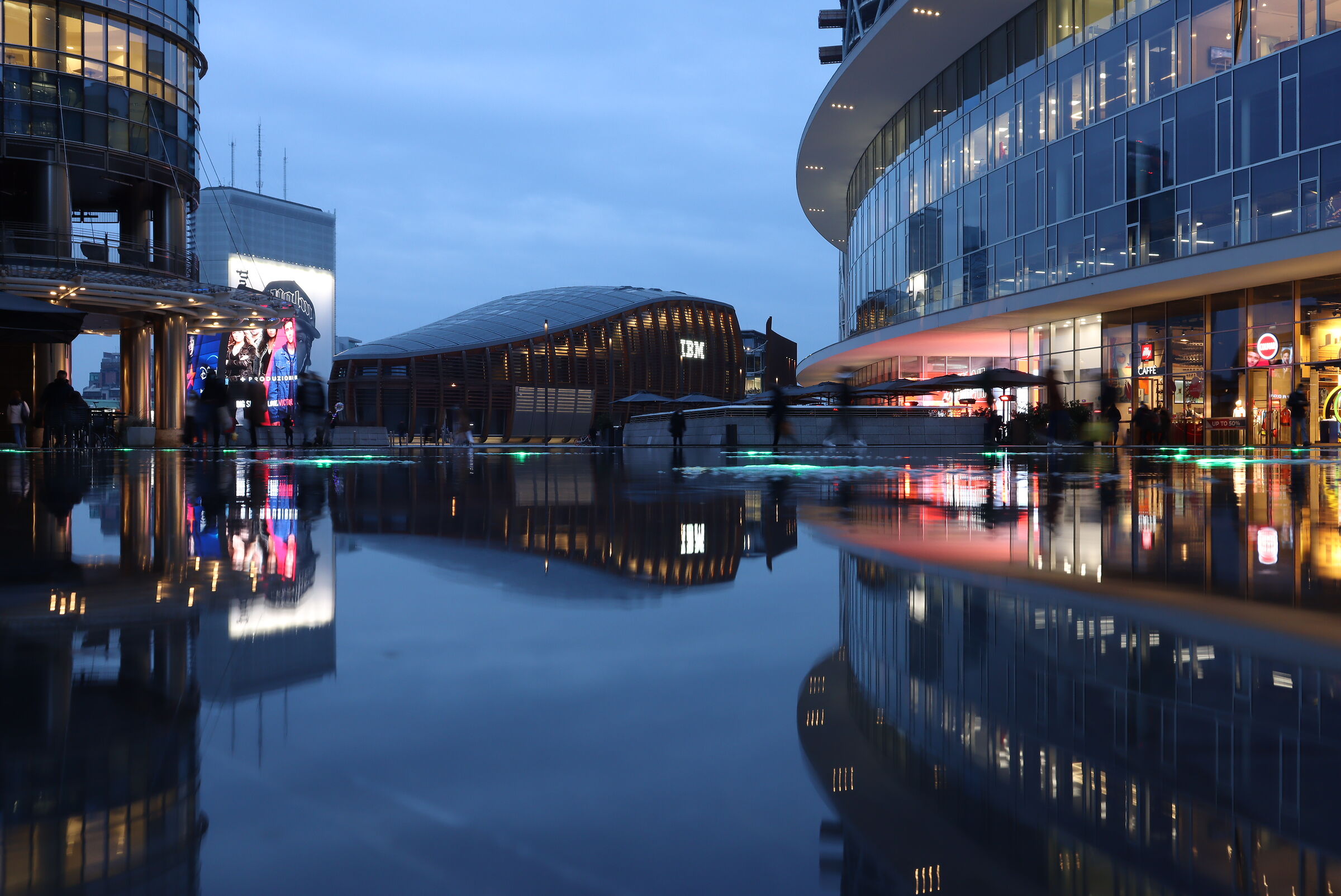 Morning reflections on Piazza Gae Aulenti