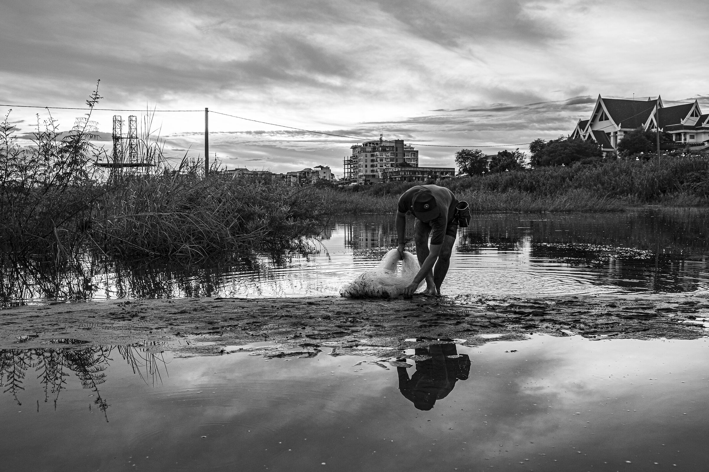 Pescatore a Vientiane Laos