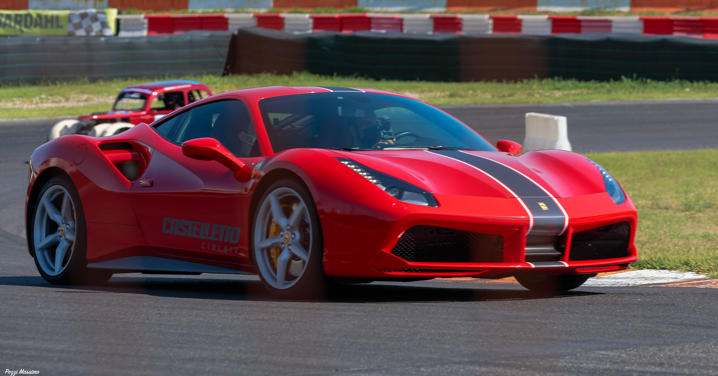 Ferrari 488 with son driving