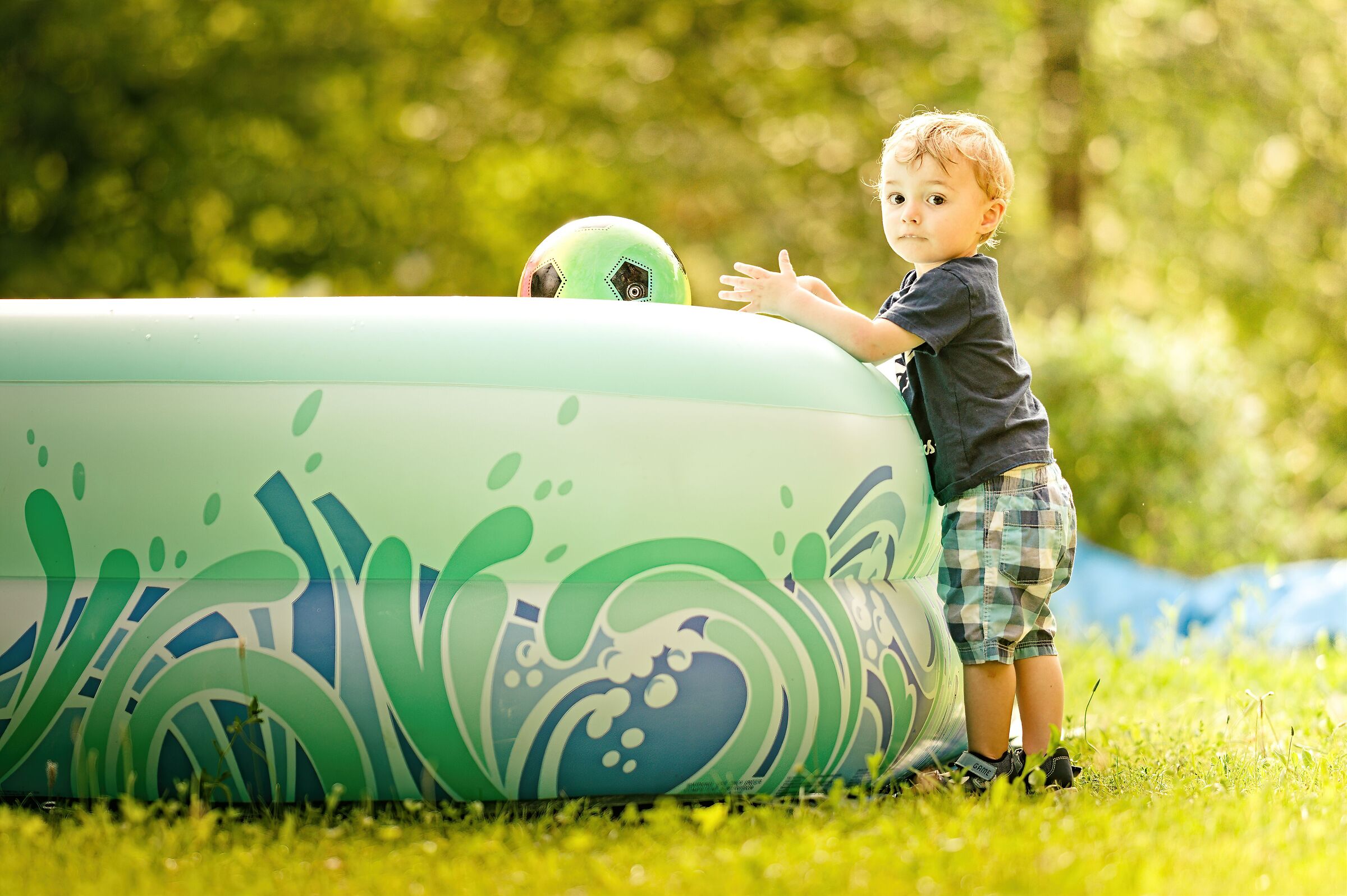 Throwing ball into the pool