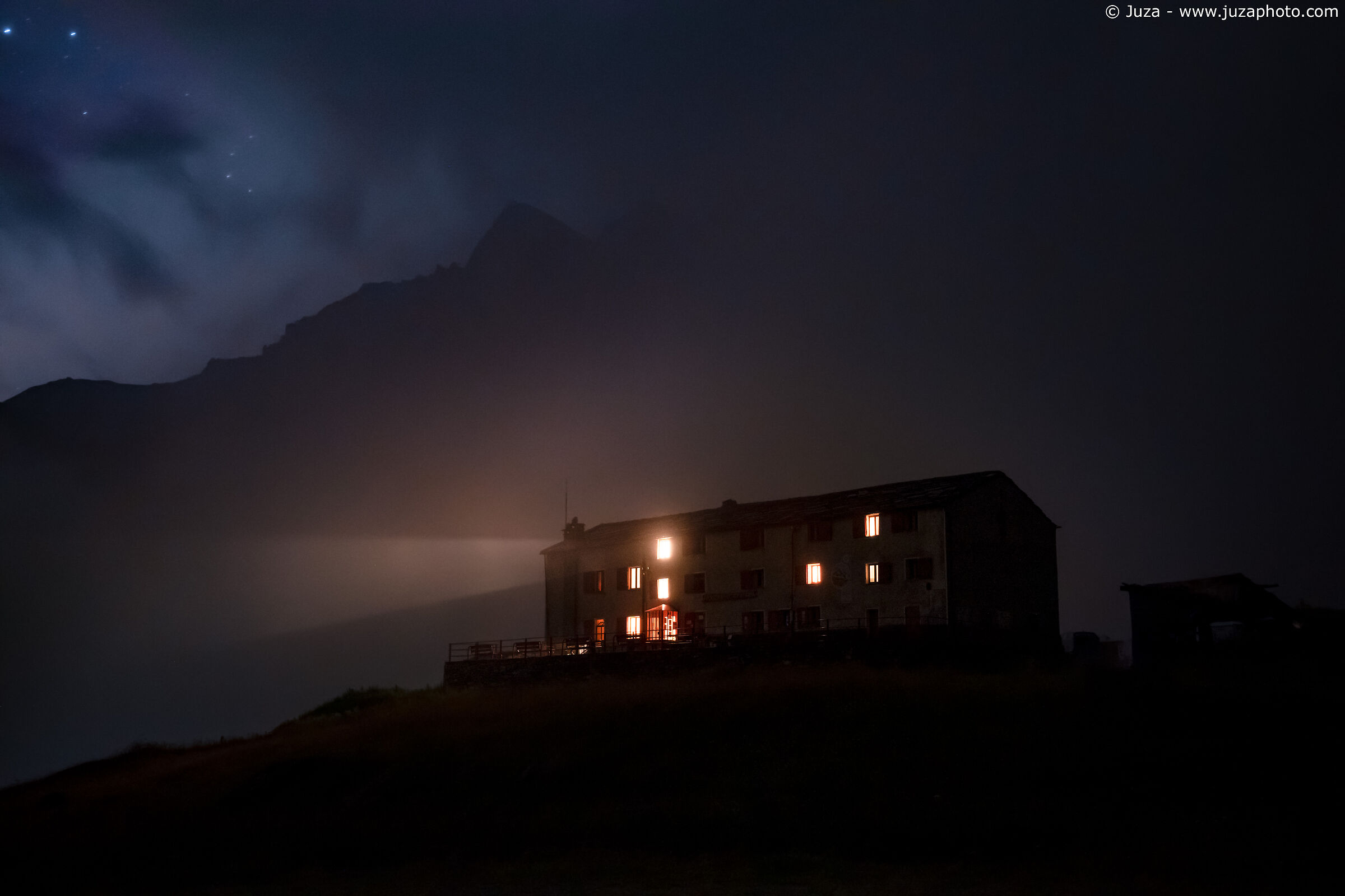 The shelter appears in the fog