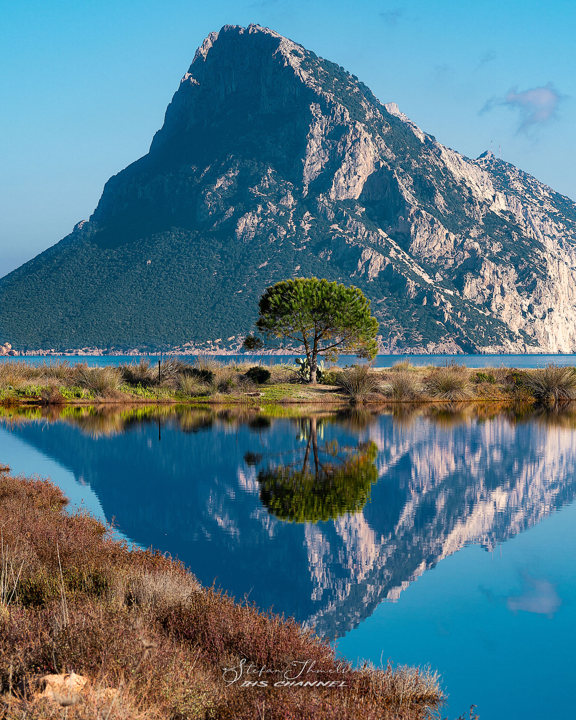 Tavolara reflected on the pond of Porto Taverna