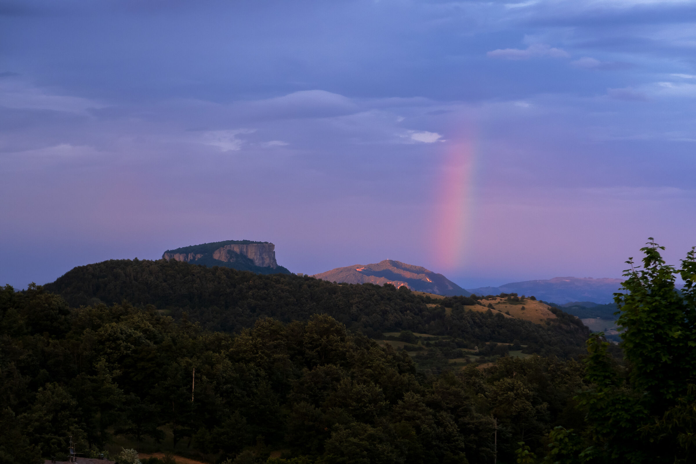 Tramonto con arcobaleno