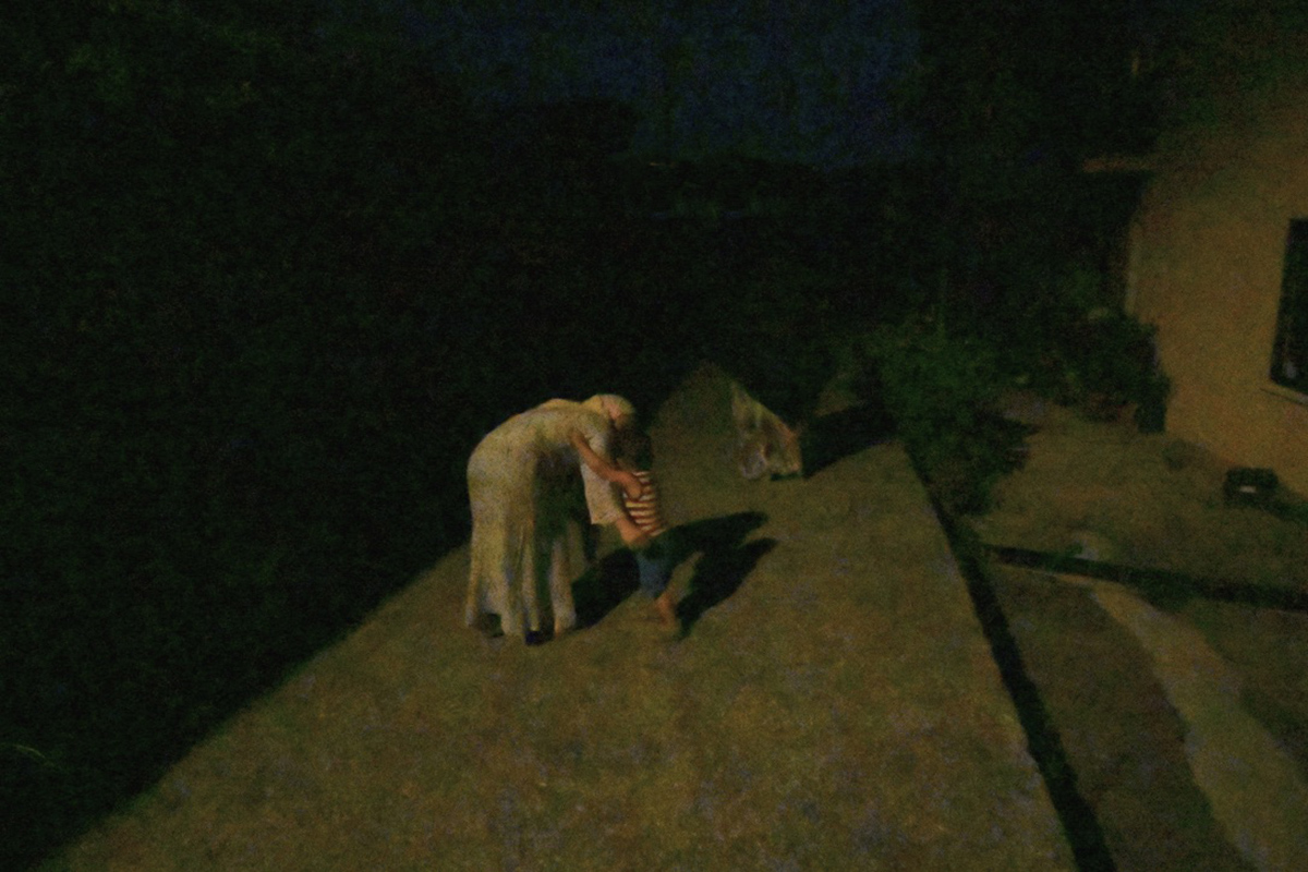 Mom... in his arms.. Shukran Province