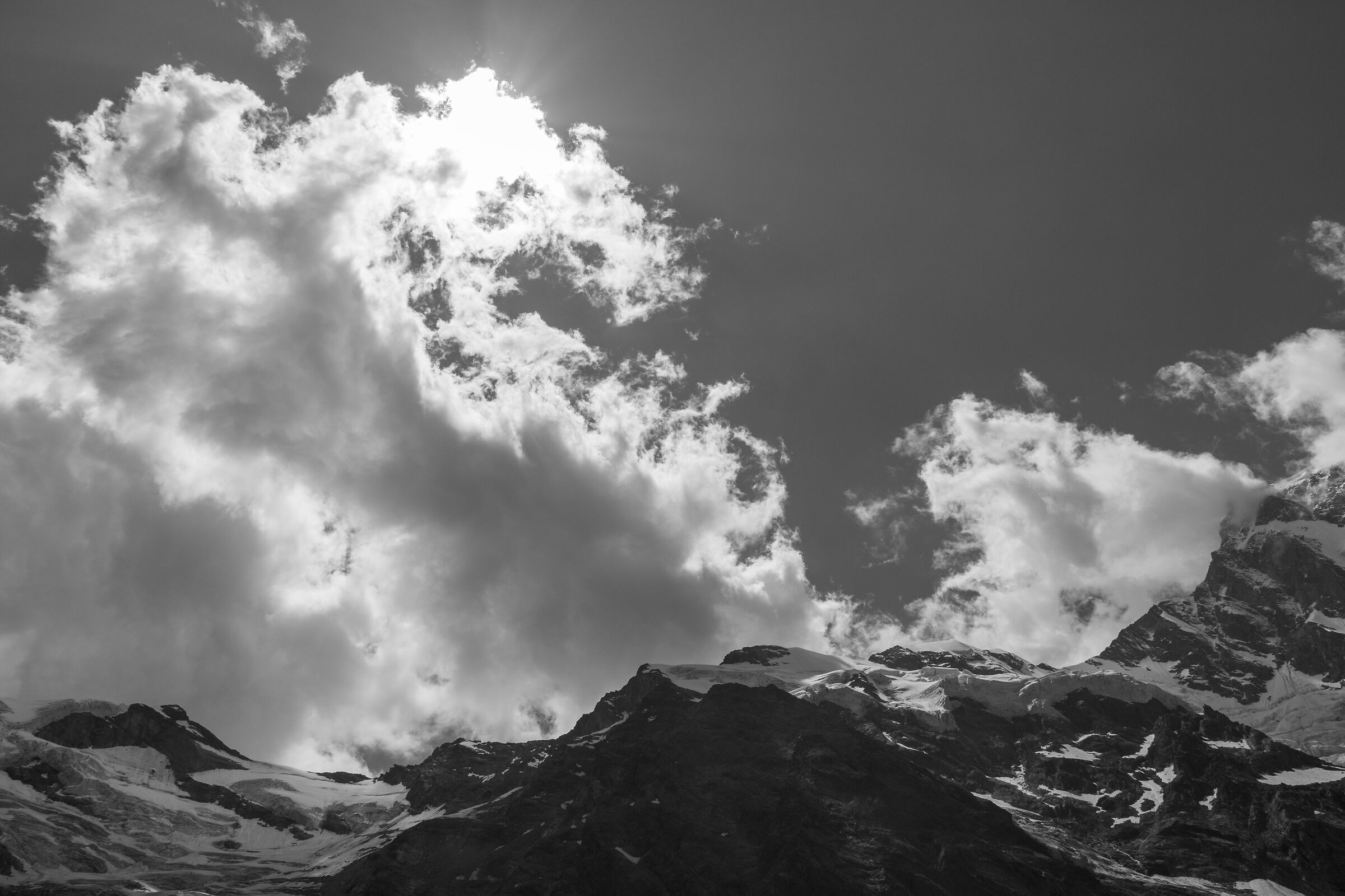 Behind the clouds...