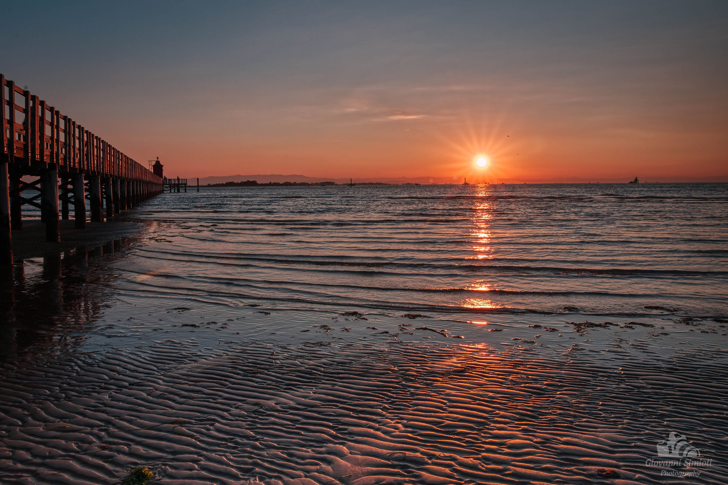 Alba al faro di Lignano Sabbiadoro